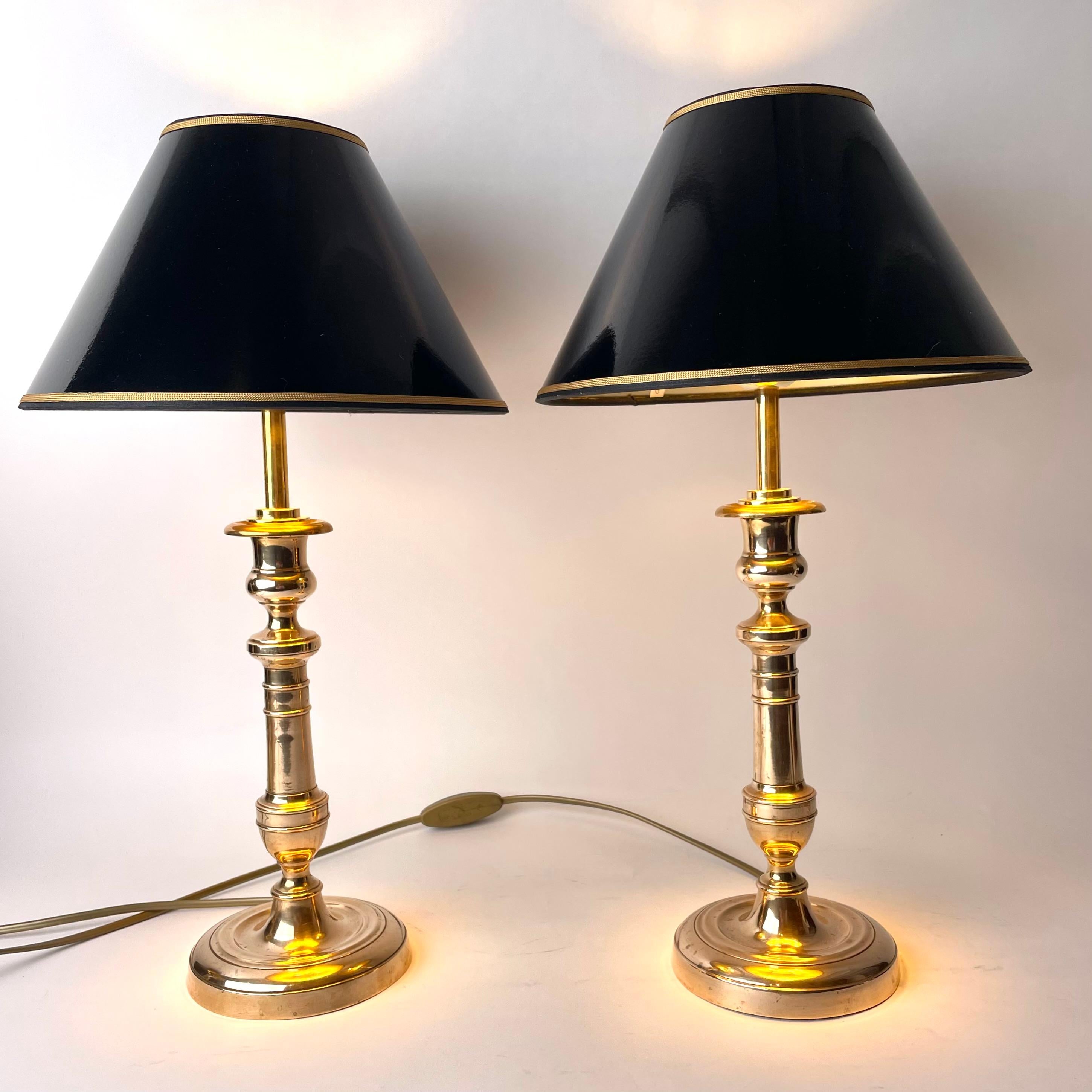 A Pair of Brass Late Empire Candlesticks, 1830s-1840s

These Empire table lamps have a refined classical appearance typical of the French Empire. They combine neoclassical architectural forms of urns and columns in a seamless manner, all while