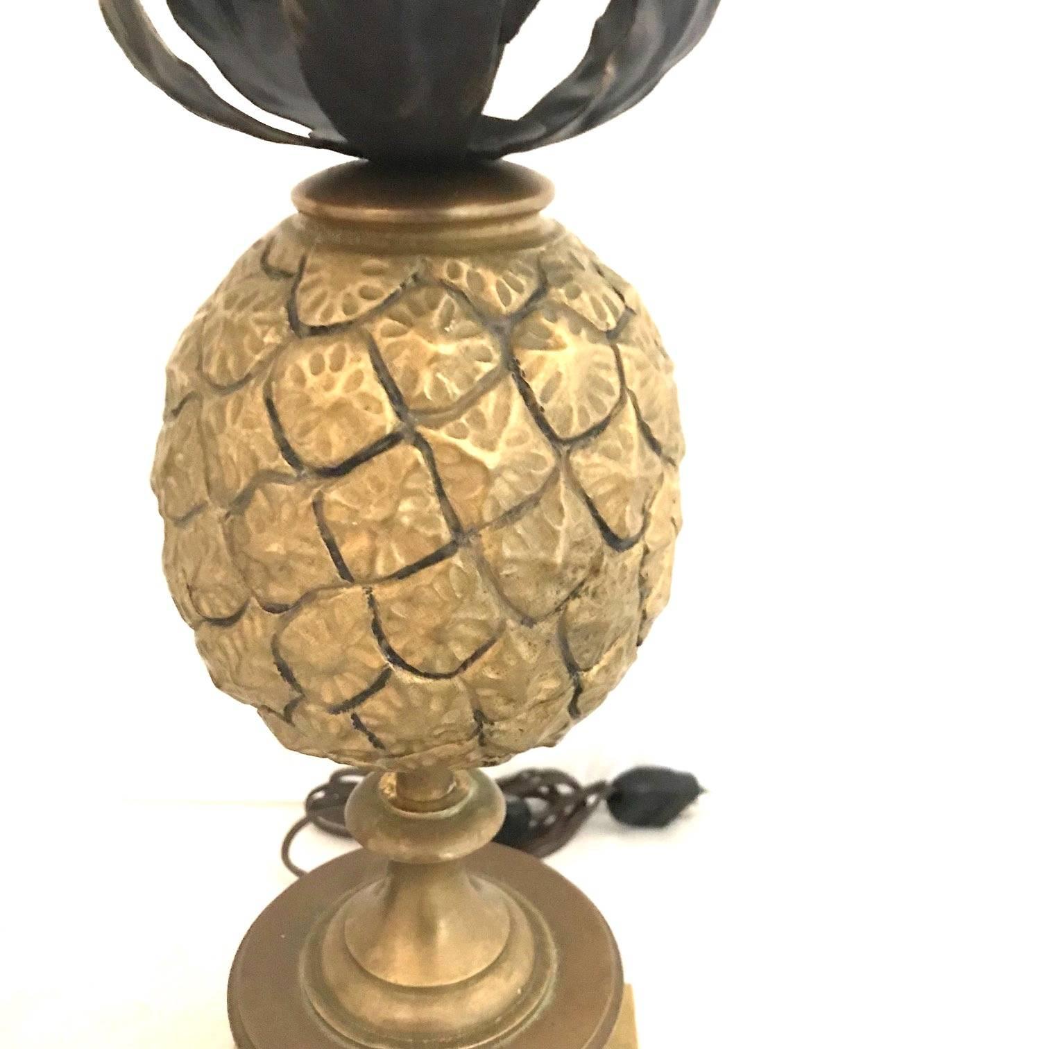 A pair of pineapple table lamps in bronze attributed to A. Jansen.