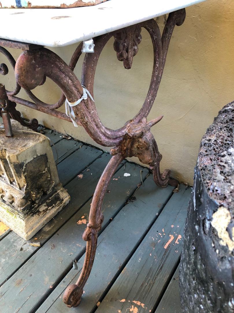 A Pair of Tables with Bull Heads Decoration with a White Marble Top For Sale 1