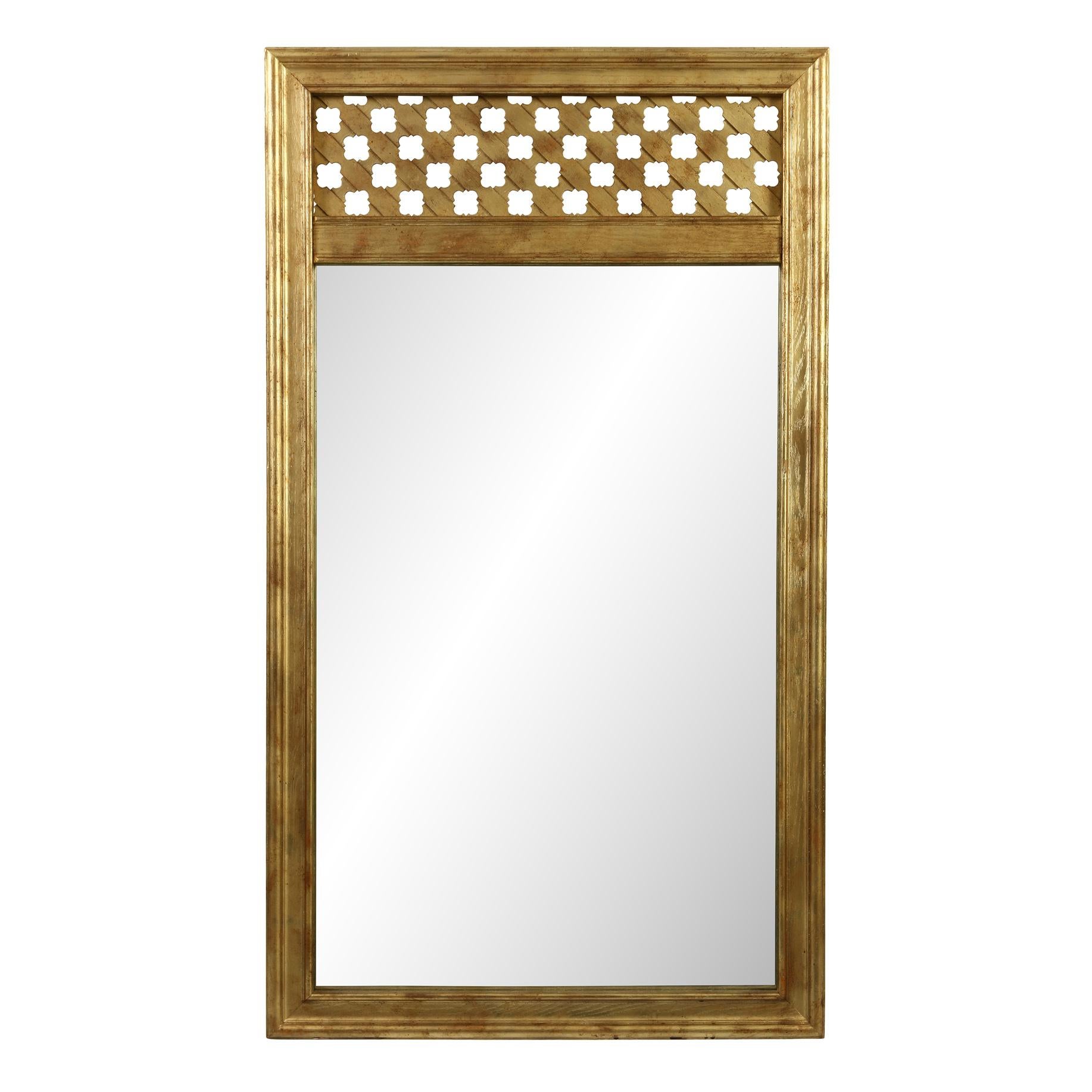 We love the clean lines of thee unique mirrors.  They are framed in a molded giltwood frame, and the top section features a reticulated design, giving this pair a lovely, yet understated elegance. 