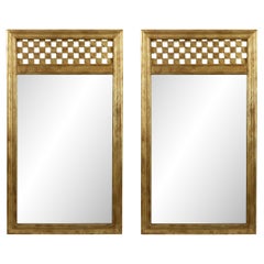 Paire de grands miroirs dorés