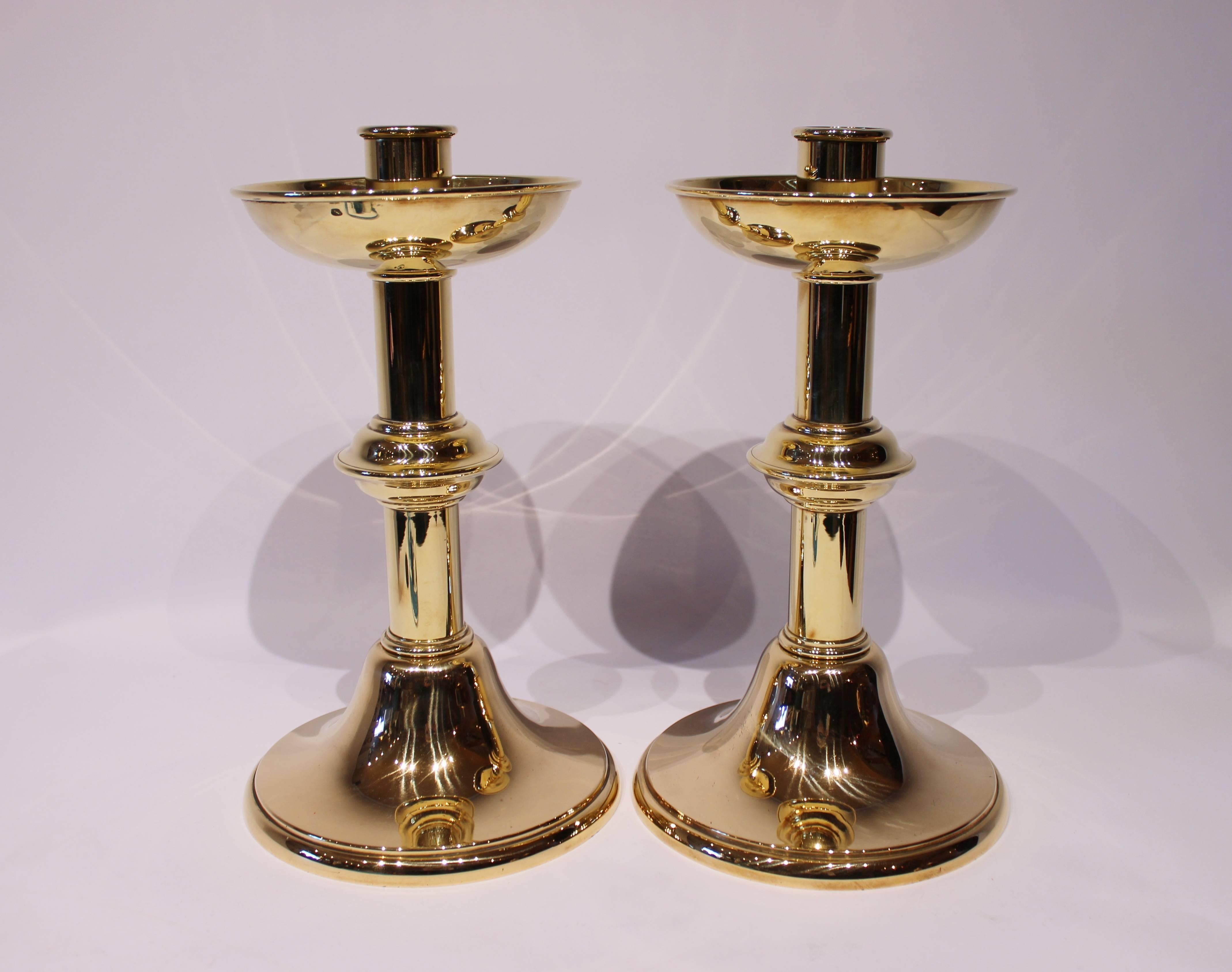 A pair of tall round brass candlesticks, in great vintage condition from circa 1930s.