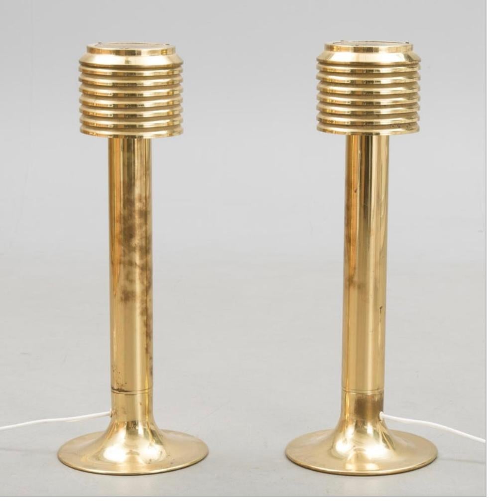 A pair of tall table lamps by Hans Agne Jakobsson, Sweden, circa 1960s. Polished brass. Measures: Heigh 26.5 inches.
Existing wiring, rewiring available upon request.