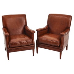 A Pair Of Tan Leather Club Chairs 
Bendic
 With Studded Details
