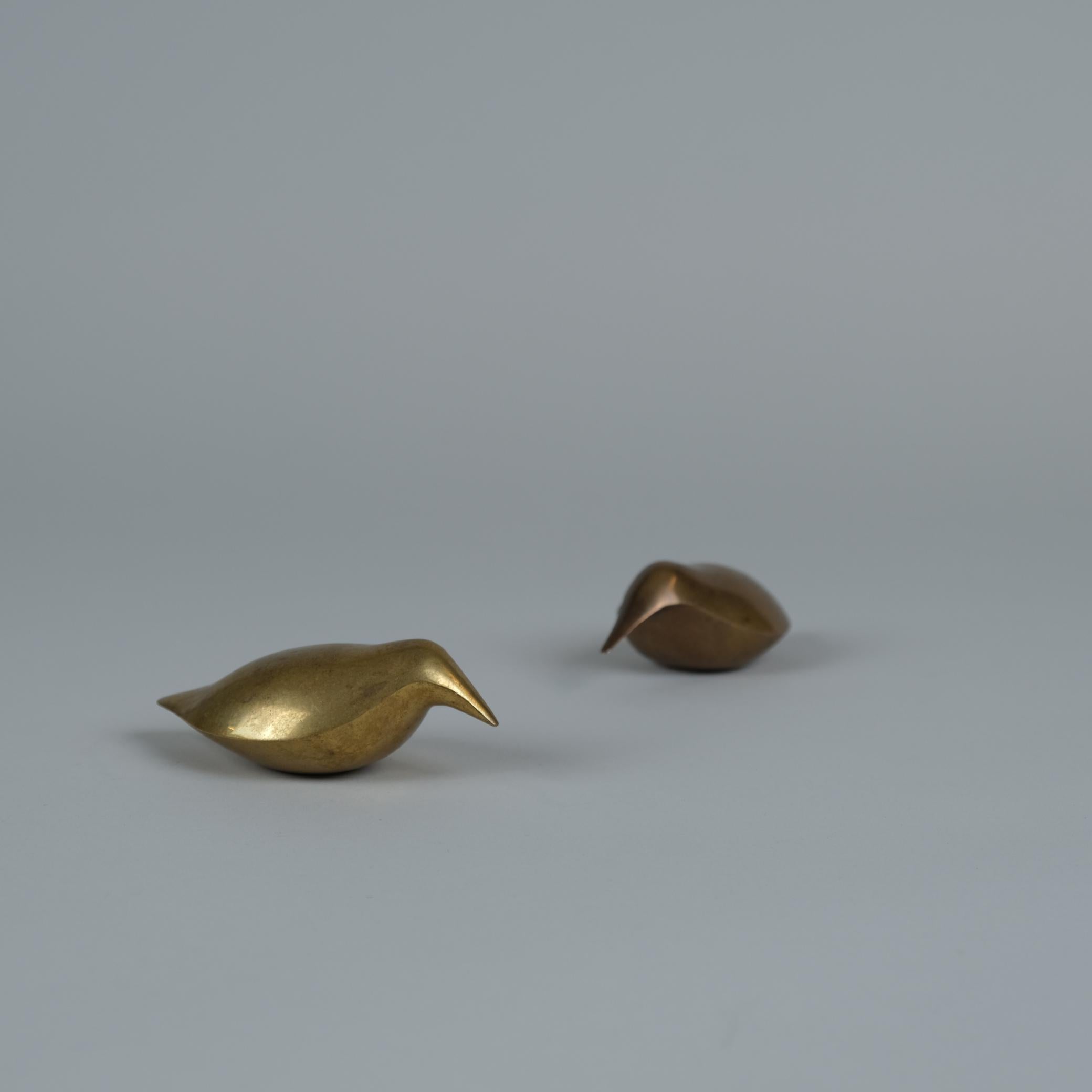 A couple of nice Tapio Wirkkala bronze bird sculptures (paper weights).  Both items are in beautiful original condition with nice vintage patinas.  Although originally intended as paper weights, these items can be considered as art objects on their