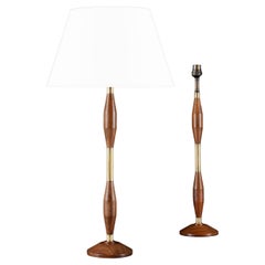 A Pair of Teak and Brass Torpedo Form Table Lamps