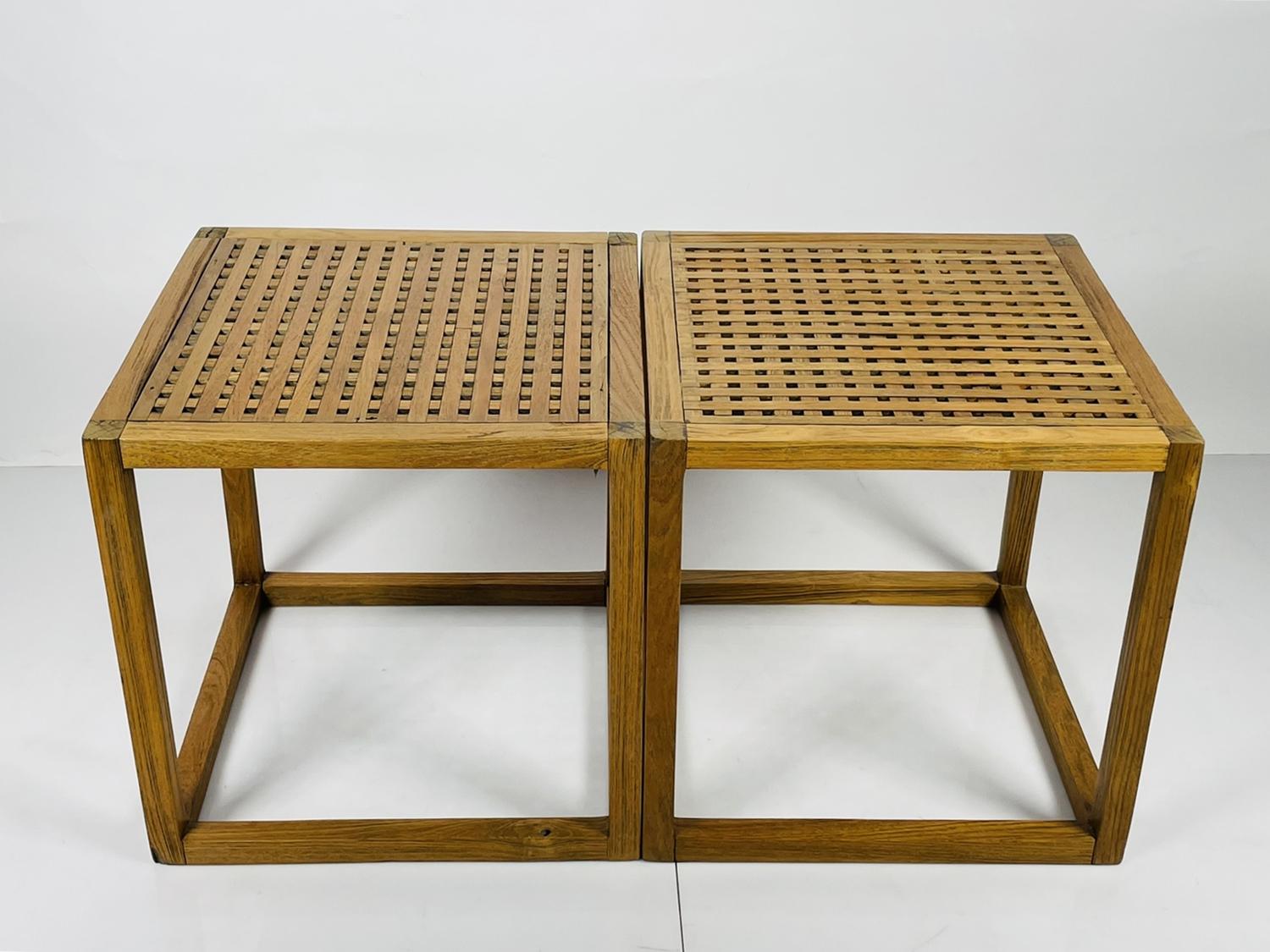 The Pair of Teak Lattice Cube Tables by Kipp Stewart for Summit Furniture are the perfect addition to any living space. These stunning square side tables feature a unique lattice style top design that adds texture and visual interest to your decor.