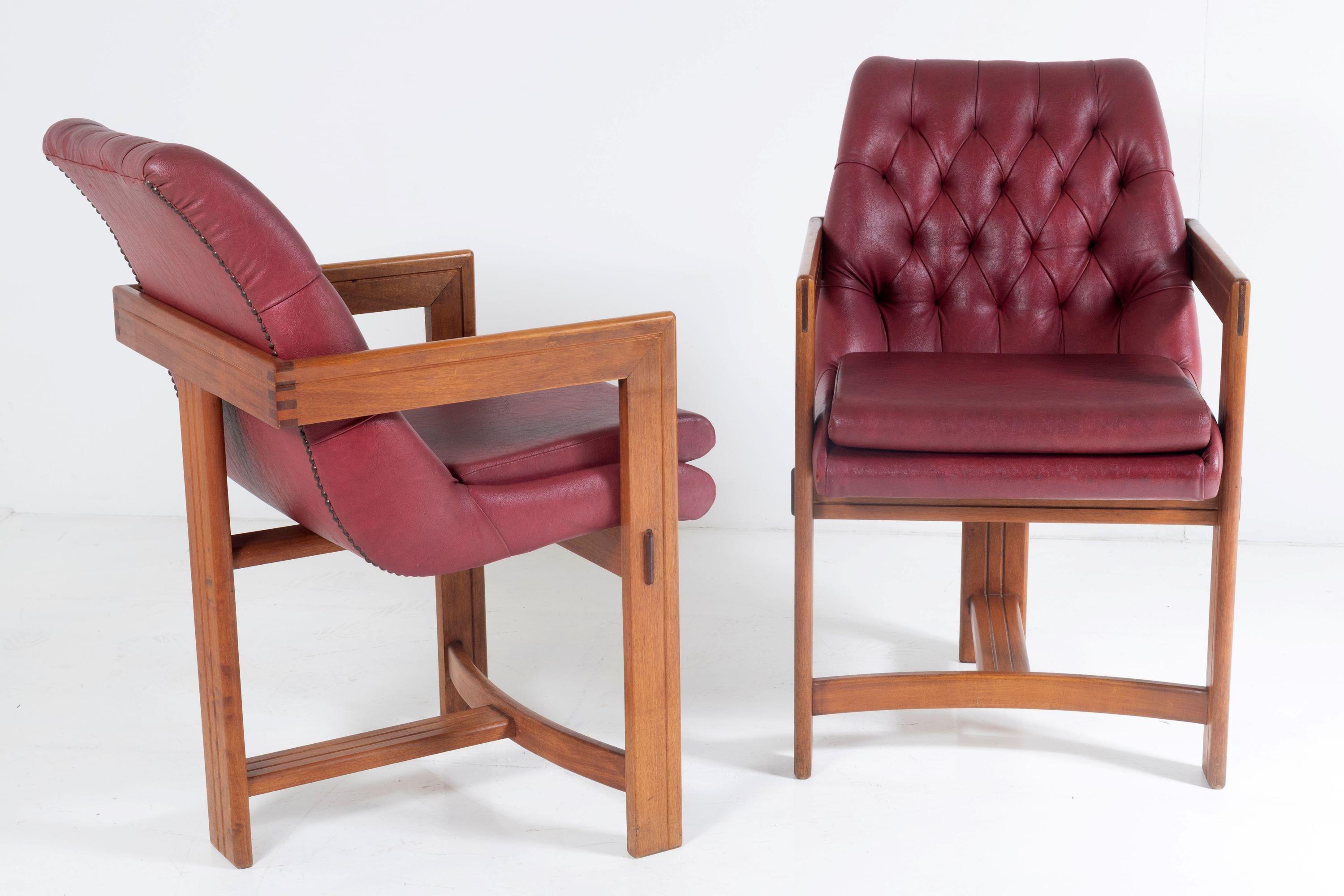 A pair of stylish Bauhaus influenced Library desk chairs, in the manner of Tobia Scarpa.
This unique pair have a wonderful style and colour. Beautifully crafted with two front legs rising to the arms which wrap around the back with a single central