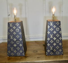 A Pair of Terracotta Painted Lamps for a Trade Display   The are extremely heavy