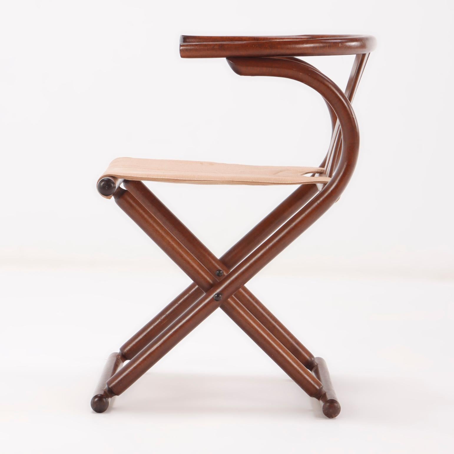 Mid-Century Modern A pair of Thonet style folding sling chairs having downswept arms For Sale