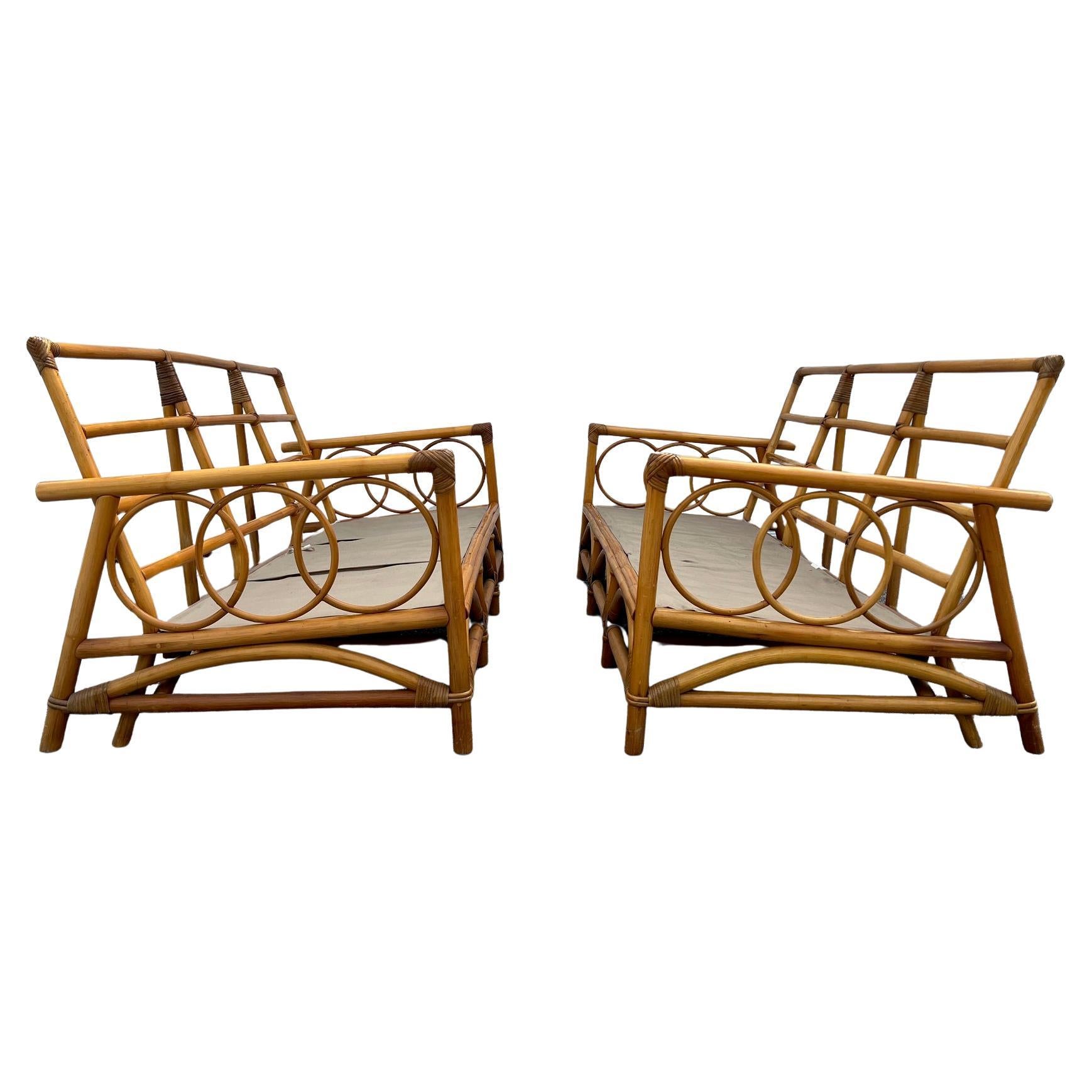 A Pair Of Three Seat Rattan Sofas For Sale