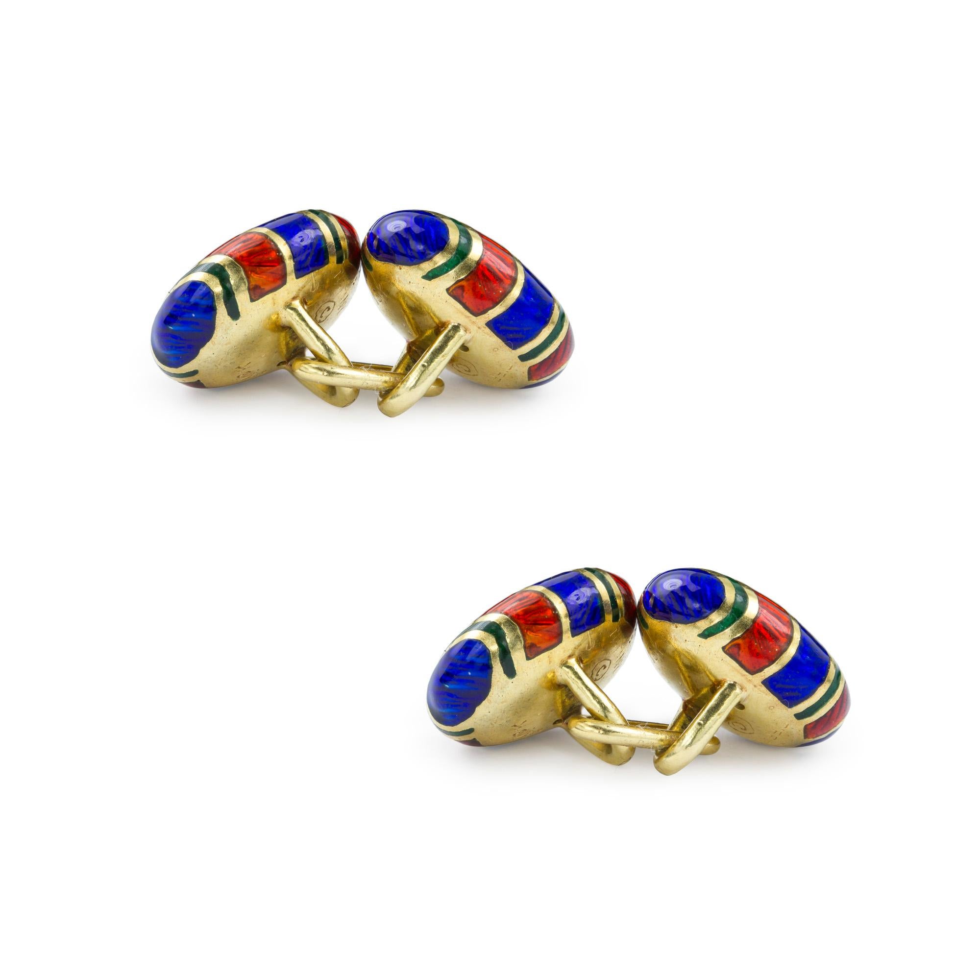 A pair of Tiffany & Co. yellow gold and enamel cufflinks,each link comprising two oval domed faces, enamelled with red, green and blue stripes to 18ct yellow gold, connected with a yellow gold chain link, signed Tiffany, circa 1960, each link