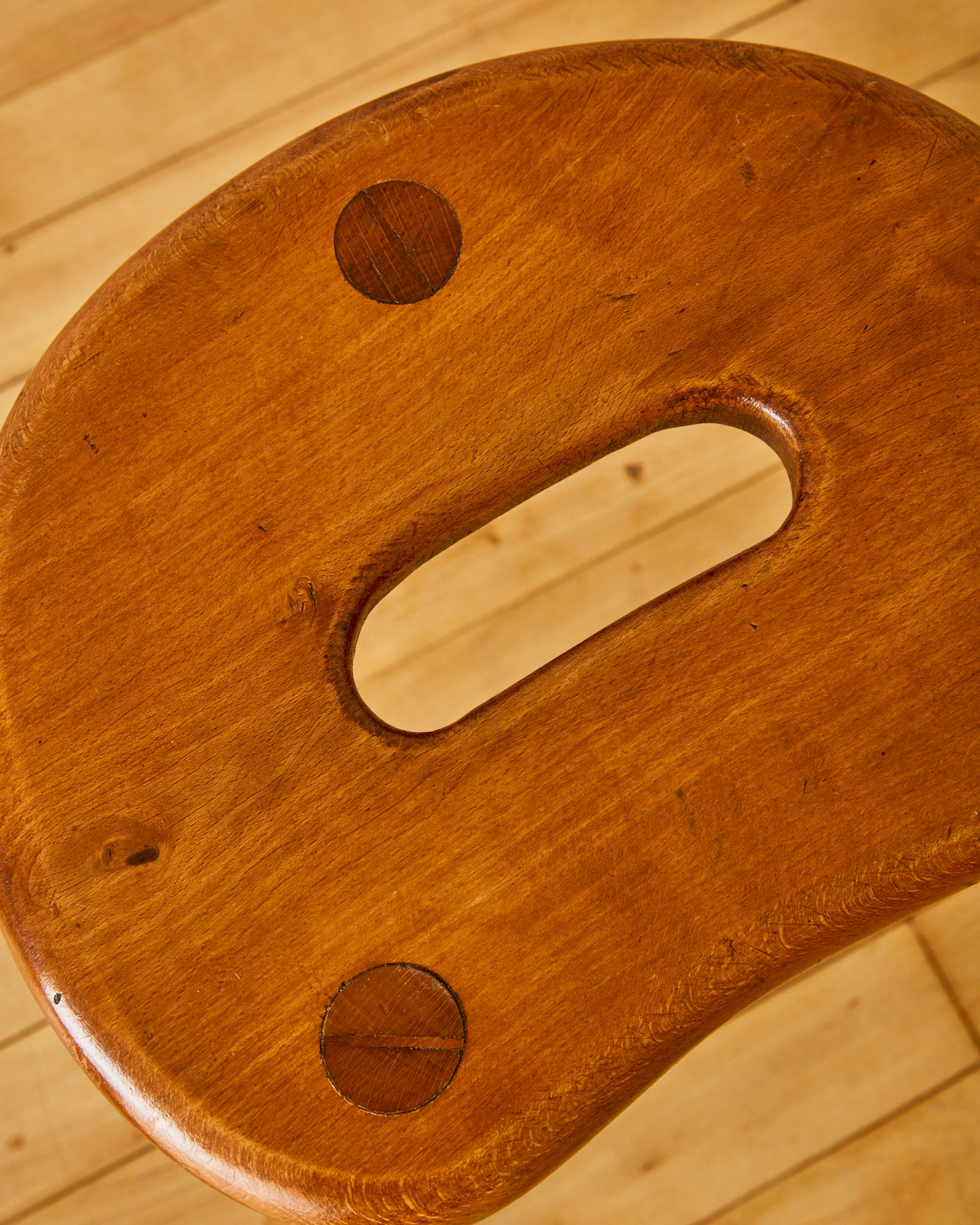 A Pair of Tripod Elm Wood Stools  In Good Condition For Sale In Long Island City, NY