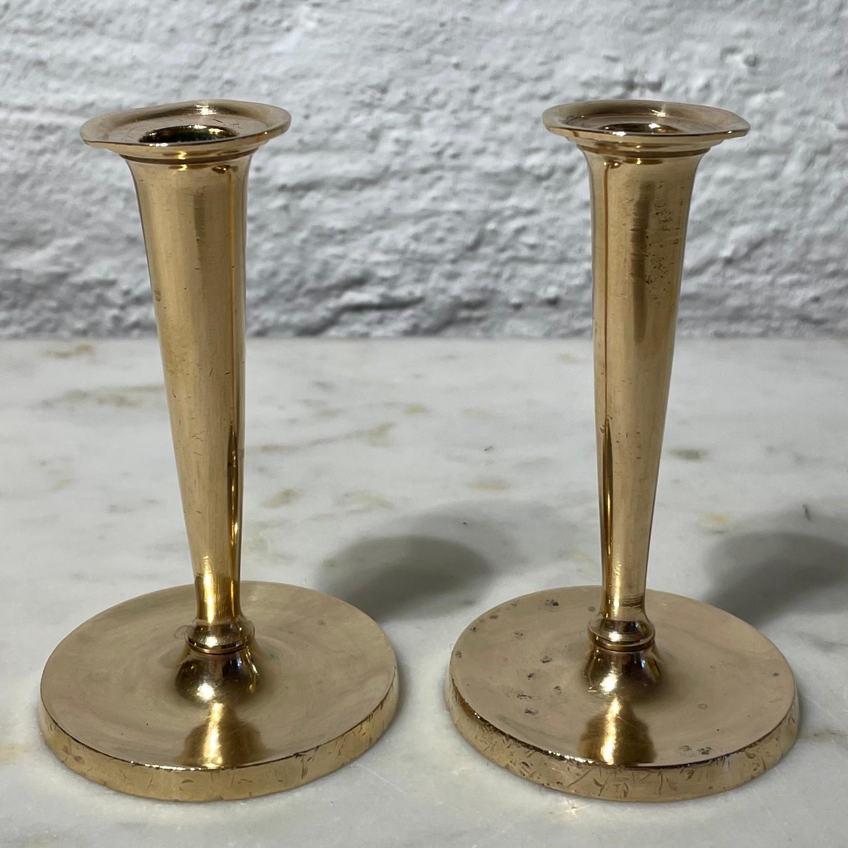 A pair of cute trumpet-shaped miniature brass candlesticks in Karl Johan, during the 1830s.

Wear consistent with age and use.