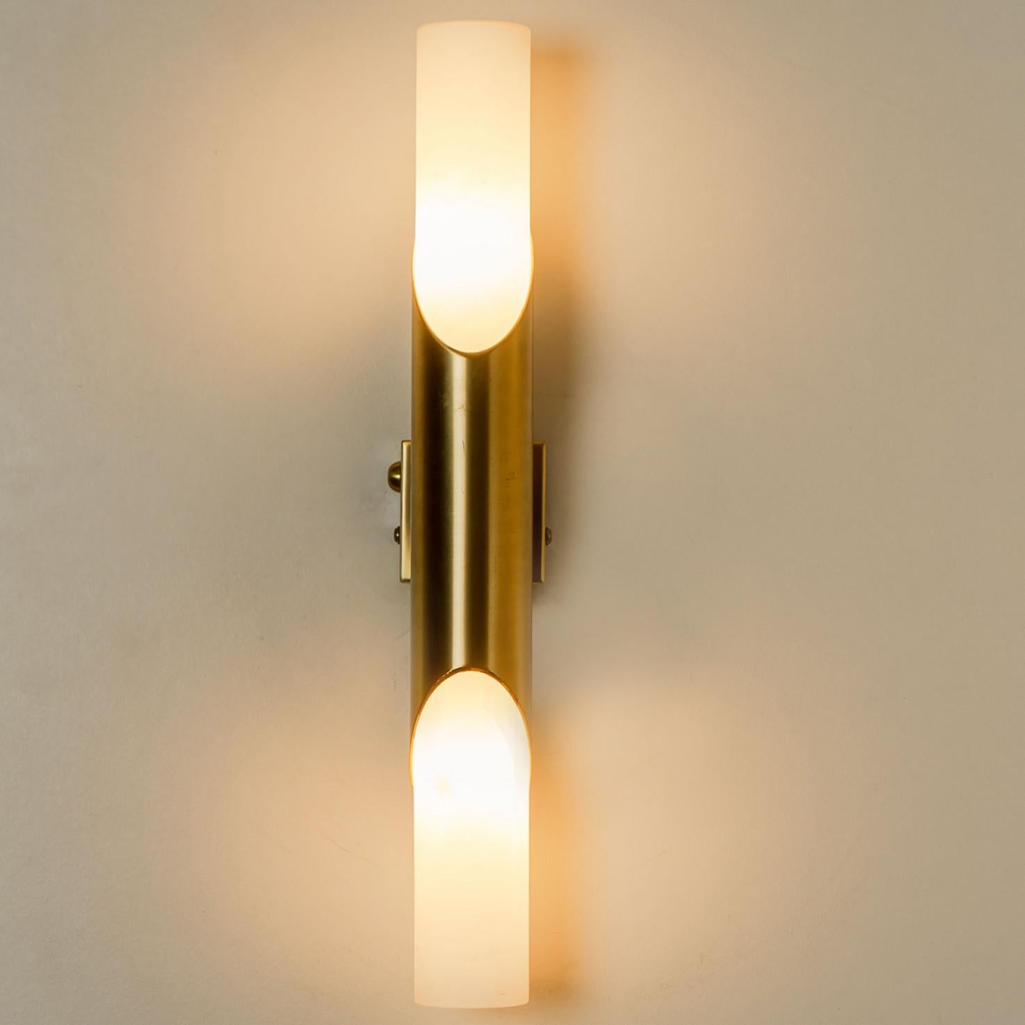 A Pair of Tube Milkglass Brass Wall Sconces, Germany, 1970s In Good Condition For Sale In Rijssen, NL
