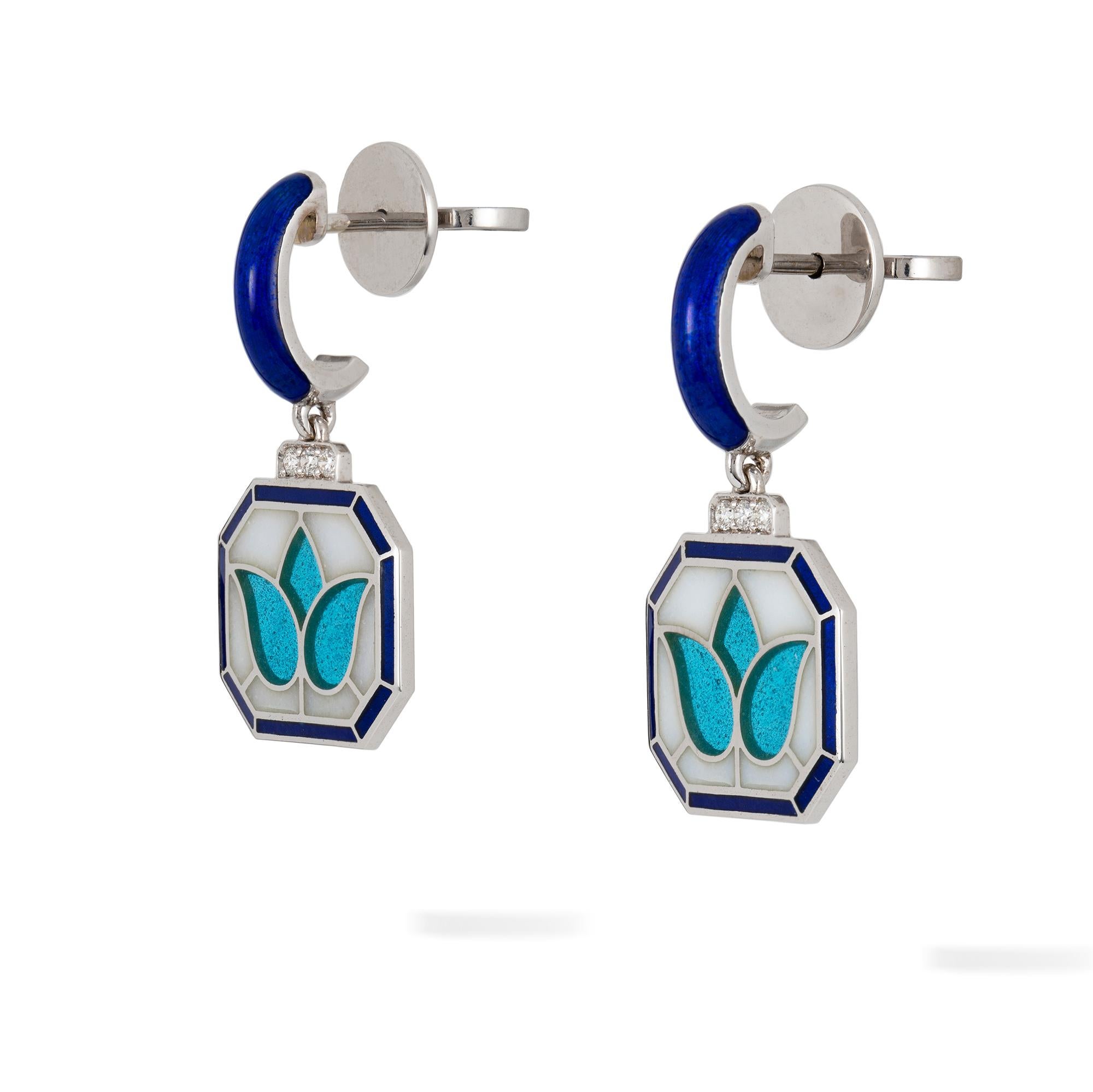 A pair of tulip earrings by Ilgiz F, each earring with an octagonal shape plaque with transparent turquoise and translucent white enamelled tulip, surrounded by dark blue enamelled frame with diamond-set top, the diamonds weighing 0.08 carats in