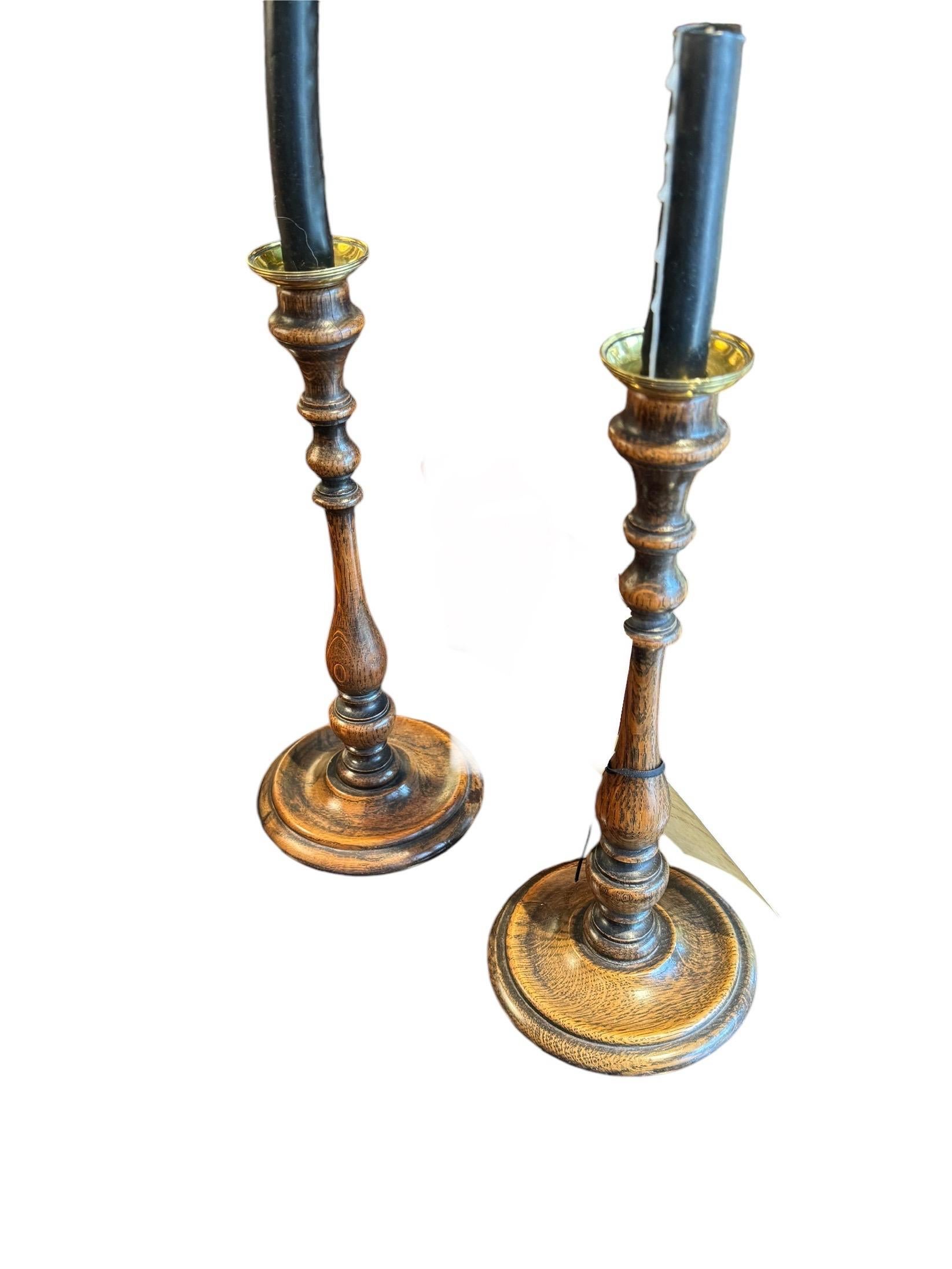 19th Century A Pair of Turned Candlesticks For Sale