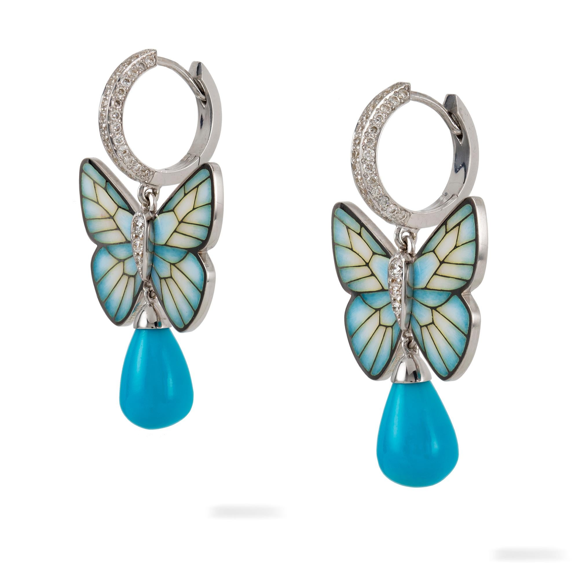A pair of turquoise butterfly earrings by Ilgiz F, each earring with a champlevé enamelled butterfly, termination to a turquoise drop, suspended by a diamond-set loop, the diamonds weighing 0.53 carats in total, all mounted in white gold, hallmarked