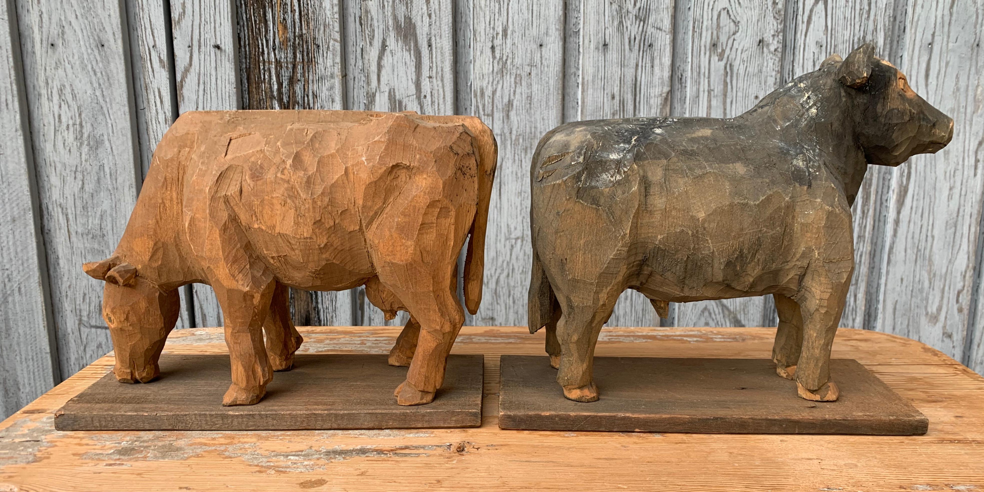 Late 20th Century Two Swedish Carved Folk Art Sculptures of a Bull and Cow