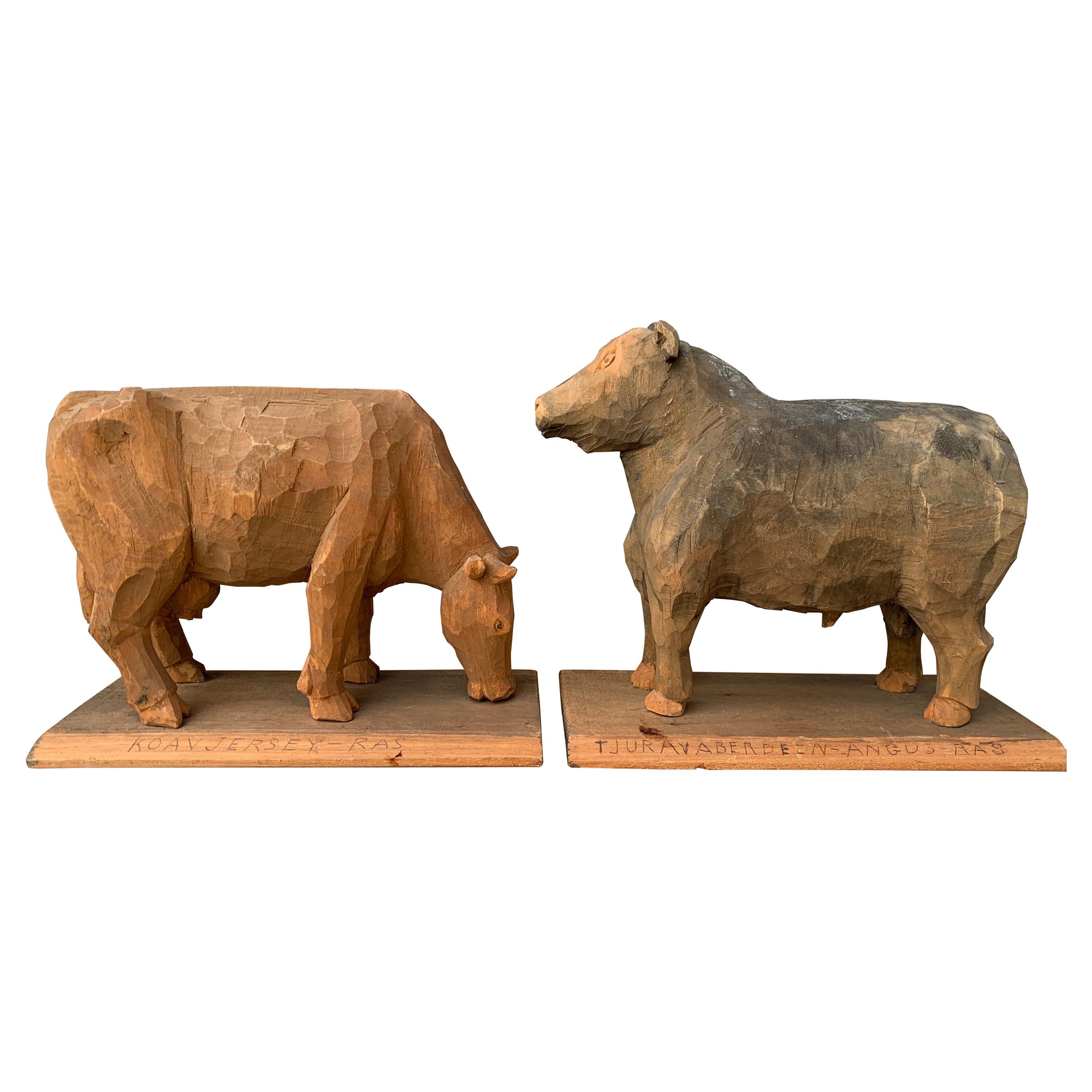 Two Swedish Carved Folk Art Sculptures of a Bull and Cow