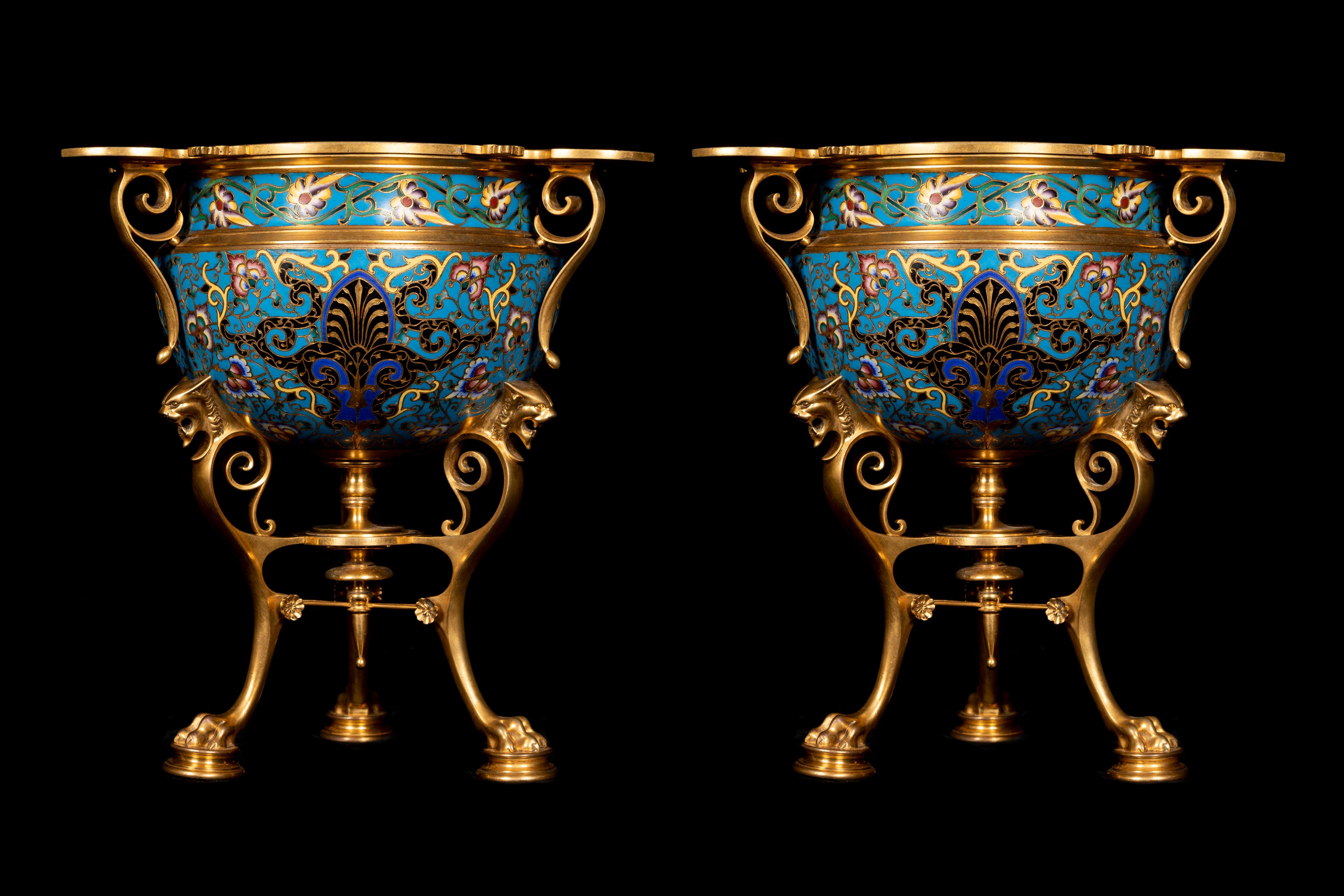 A Pair of extremely unique Antique Ferdinand Barbedienne Figural ormolu bronze and champleve enamel neoclassical jardiniers /centerpieces of exquisite craftsmanship  signed by Ferdinand Barbedienne. These museum quality blue turquoise enamel