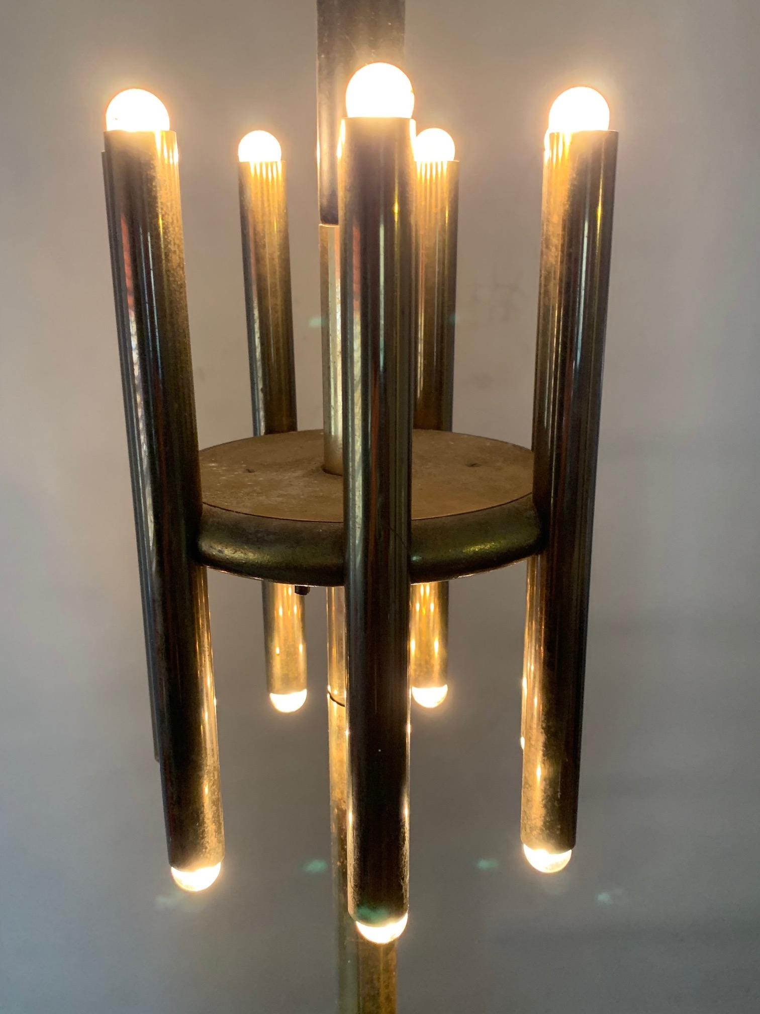 A great pair of vintage brass pole lamps. In the style of Lightolier or Stilnovo  made by Stiffel ca' 1950's. These have a lot of presence and style and height adjusts to 107