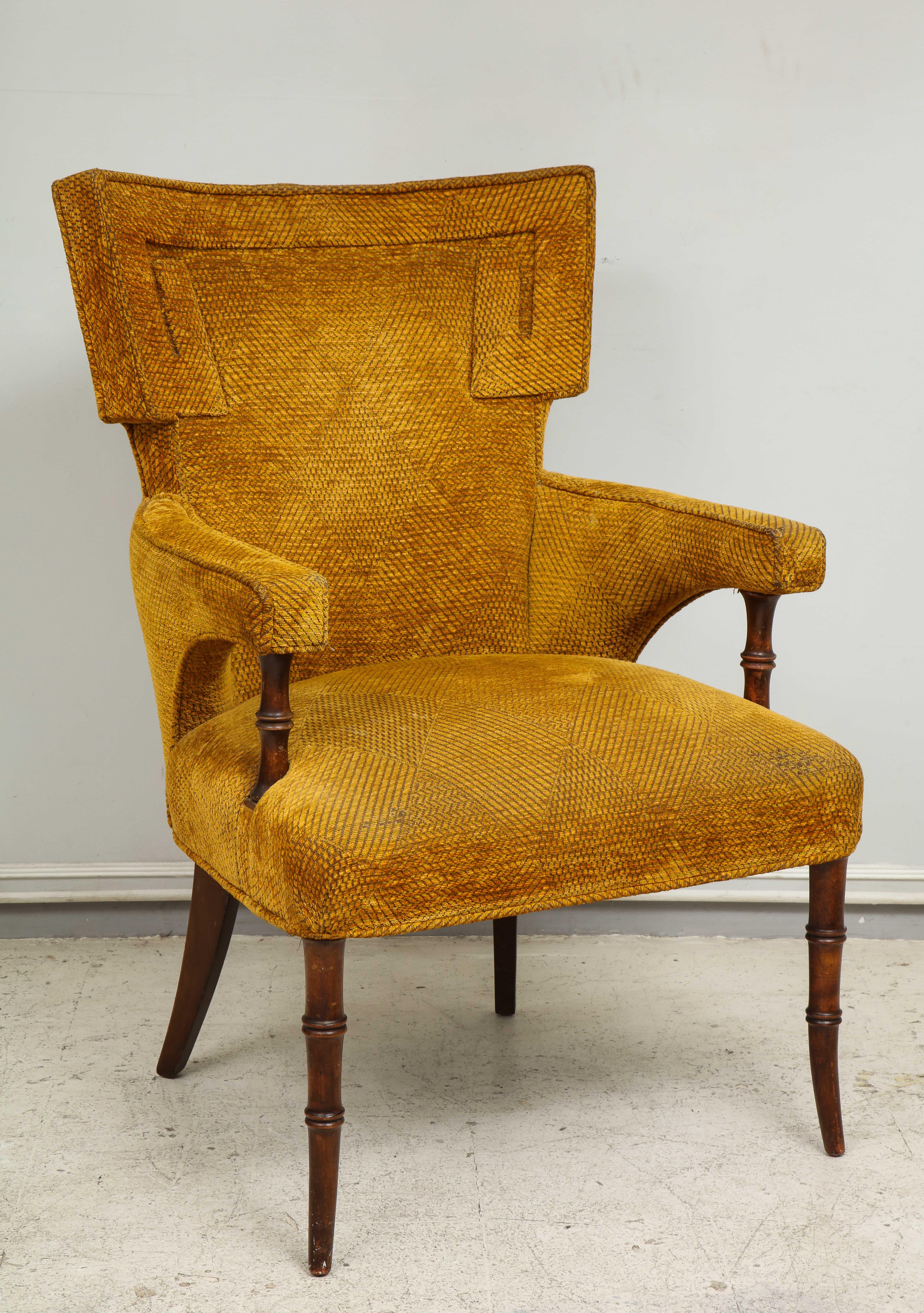 A pair of upholstered faux-bamboo fireside armchairs.