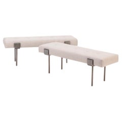 A pair of upholstered iron benches. Contemporary.
