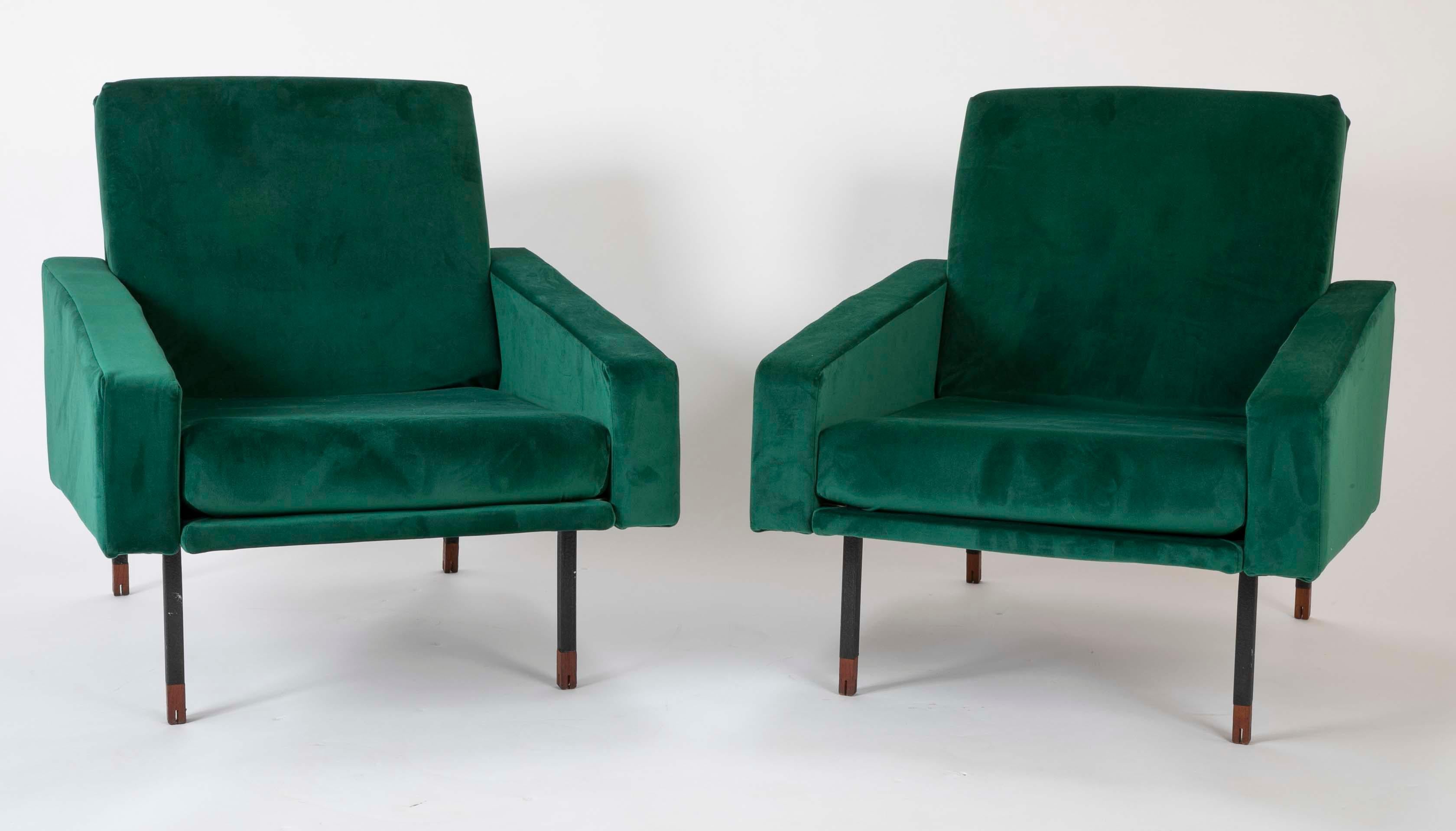 A pair of Italian Mid-Century armchairs in emerald green ultra-suede. Blackened steel frame tipped with walnut feet.