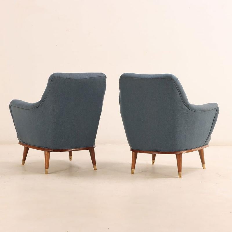 Argentine A pair of upholstered lounge chairs by Englander and Bonta For Sale