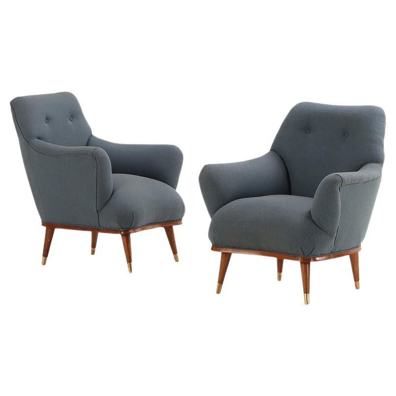 A pair of upholstered lounge chairs by Englander and Bonta For Sale