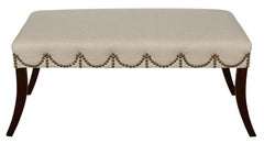 Paire d'ottomans tapissés