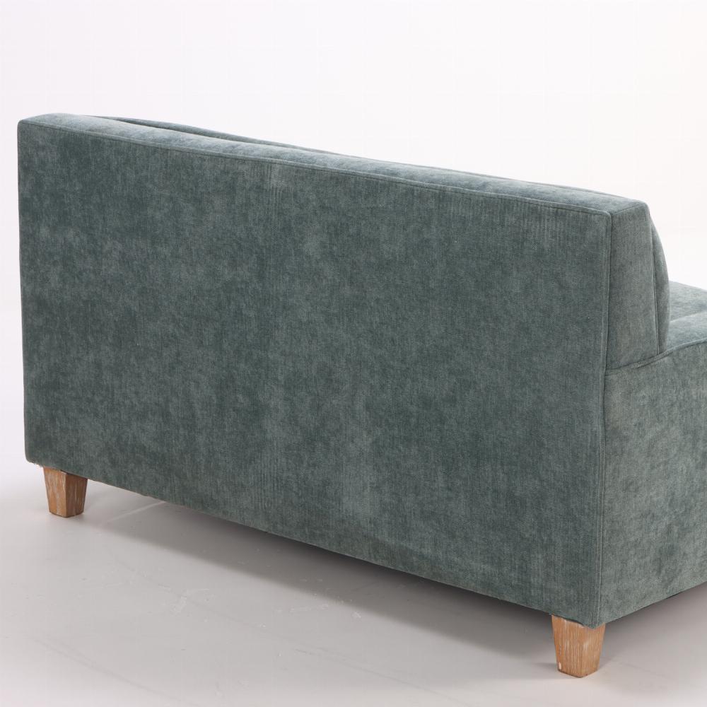 Found in Argentina, this pair of upholstered settees have straight backs, low squared arms, and are supported by short cerused oak feet. Newly reupholstered with new fabric, these offer a wonderful spot to lounge.