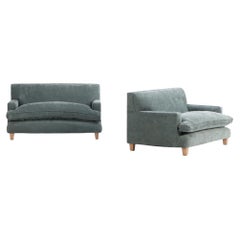 A pair of upholstered settees, in the manner of Jean-Michel Frank, C. 1960.