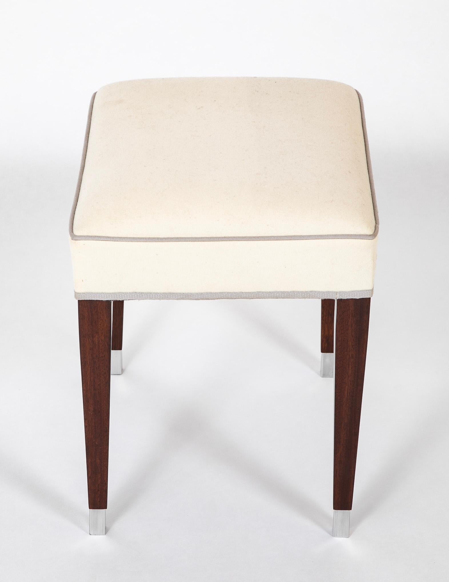 20th Century A Pair of Upholstered Stools by Jacques Adnet For Sale