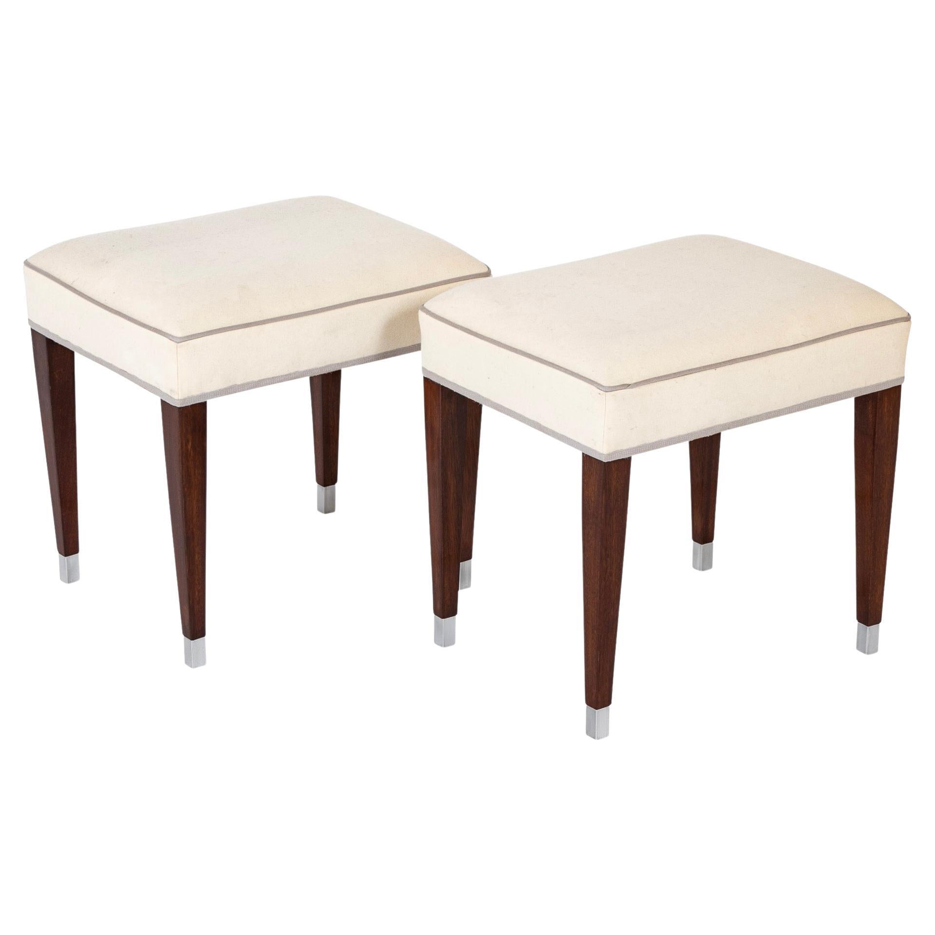 A Pair of Upholstered Stools by Jacques Adnet For Sale