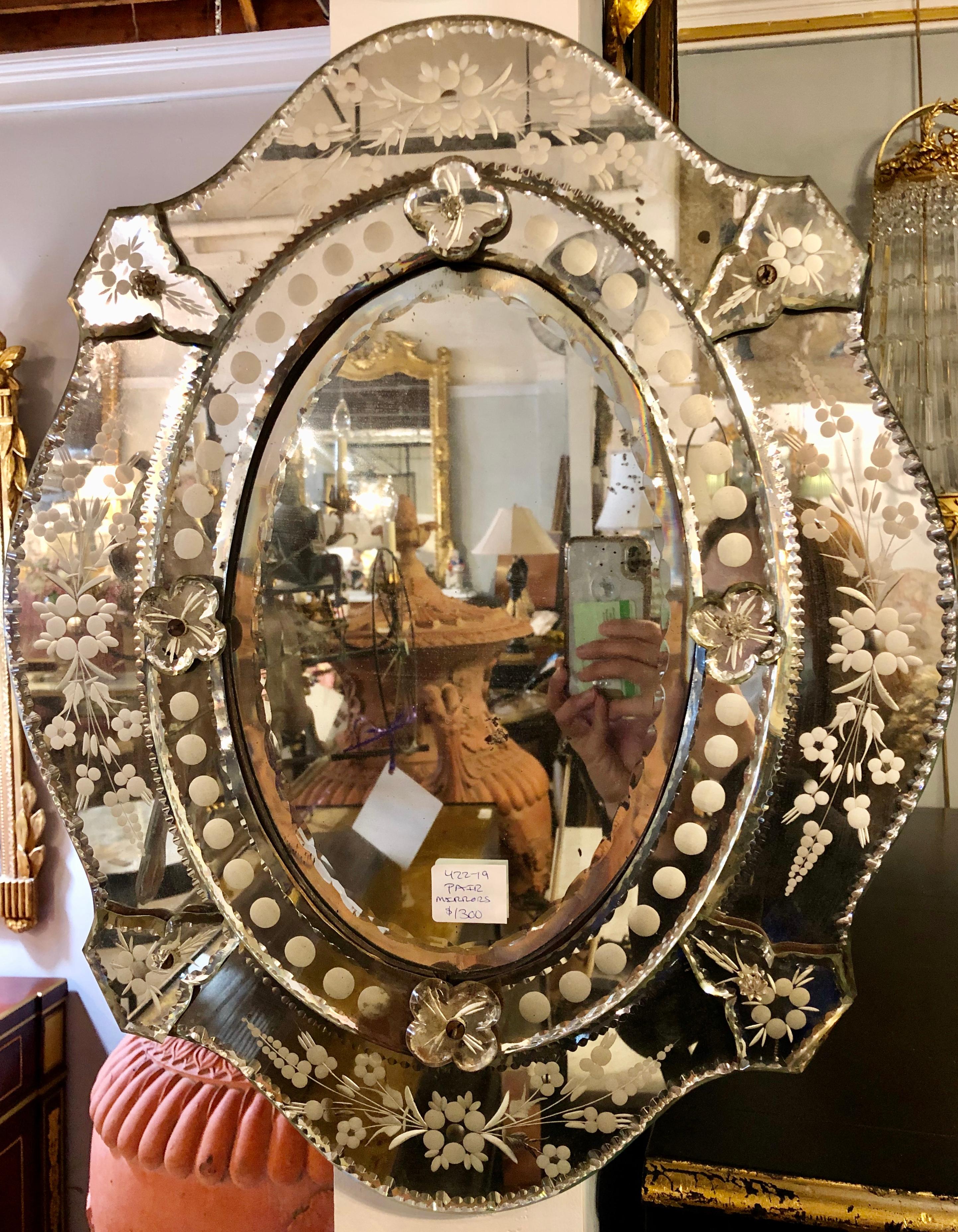 Pair of Venetian etched glass wall mirrors.
 