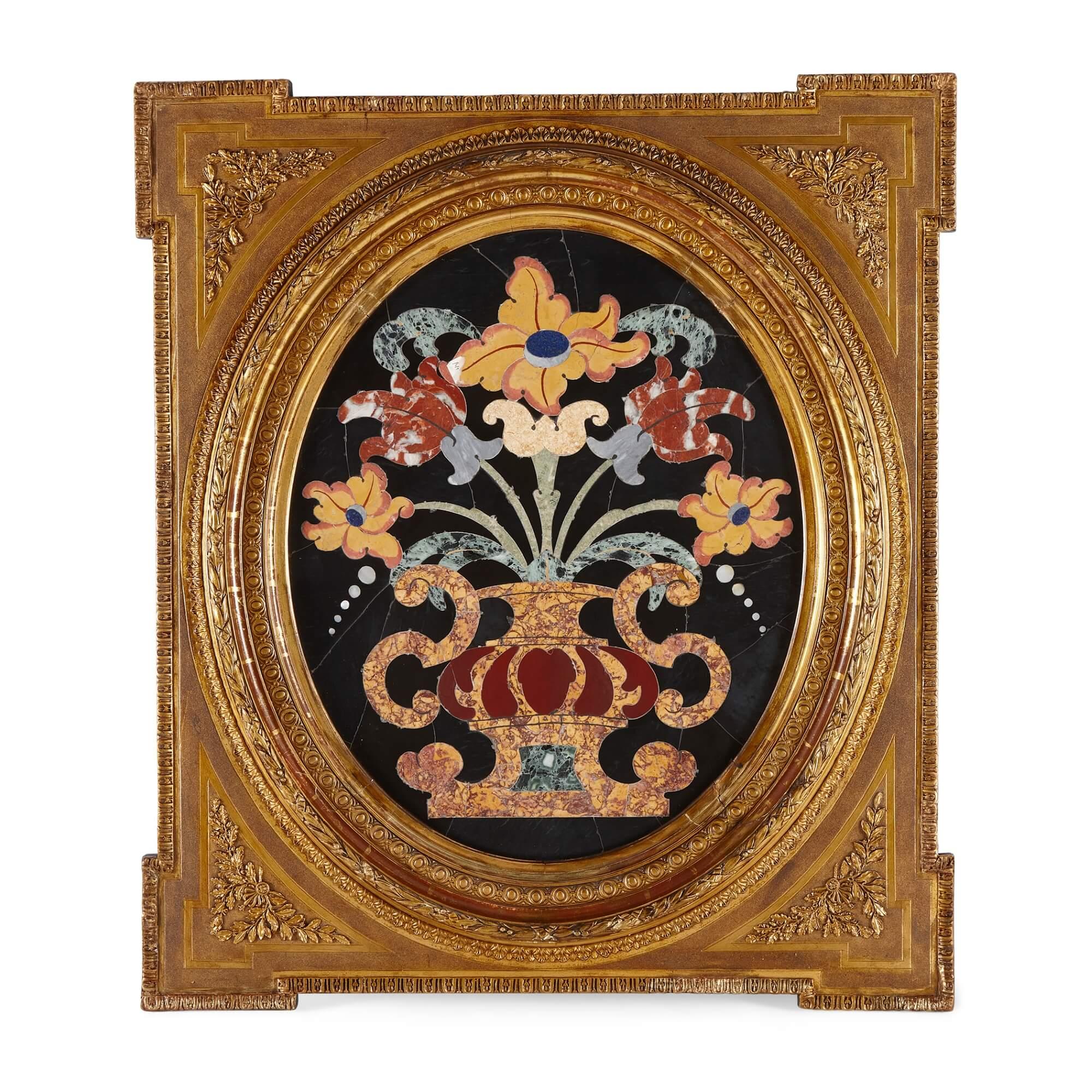 A pair of very fine, large Italian Pietra Dura marquetry panels
Italian, 19th century
Measures: Panels: height 64cm, width 53cm, depth 2cm
Frames: height 88cm, width 77cm, depth 6cm

Comprising black marble panels of oval form, set with semi