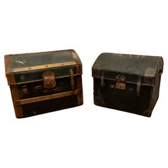 Pair of Victorian Canvas and Leather Dome Top Travel Trunks