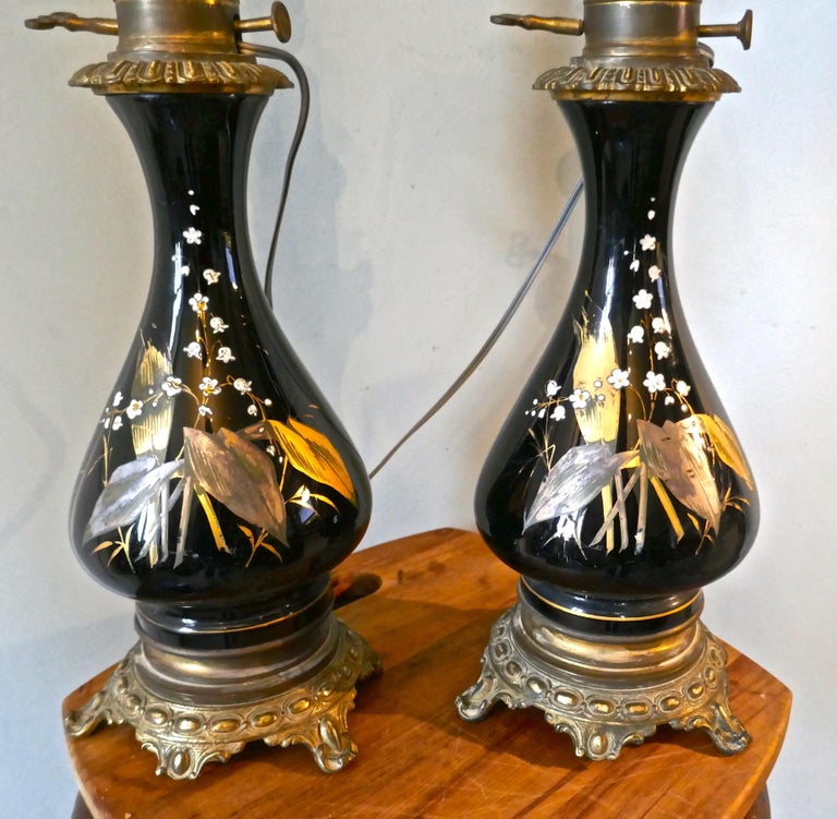 Pair of Victorian Ceramic Oil Lamps Decorated with Lilly of the Valley