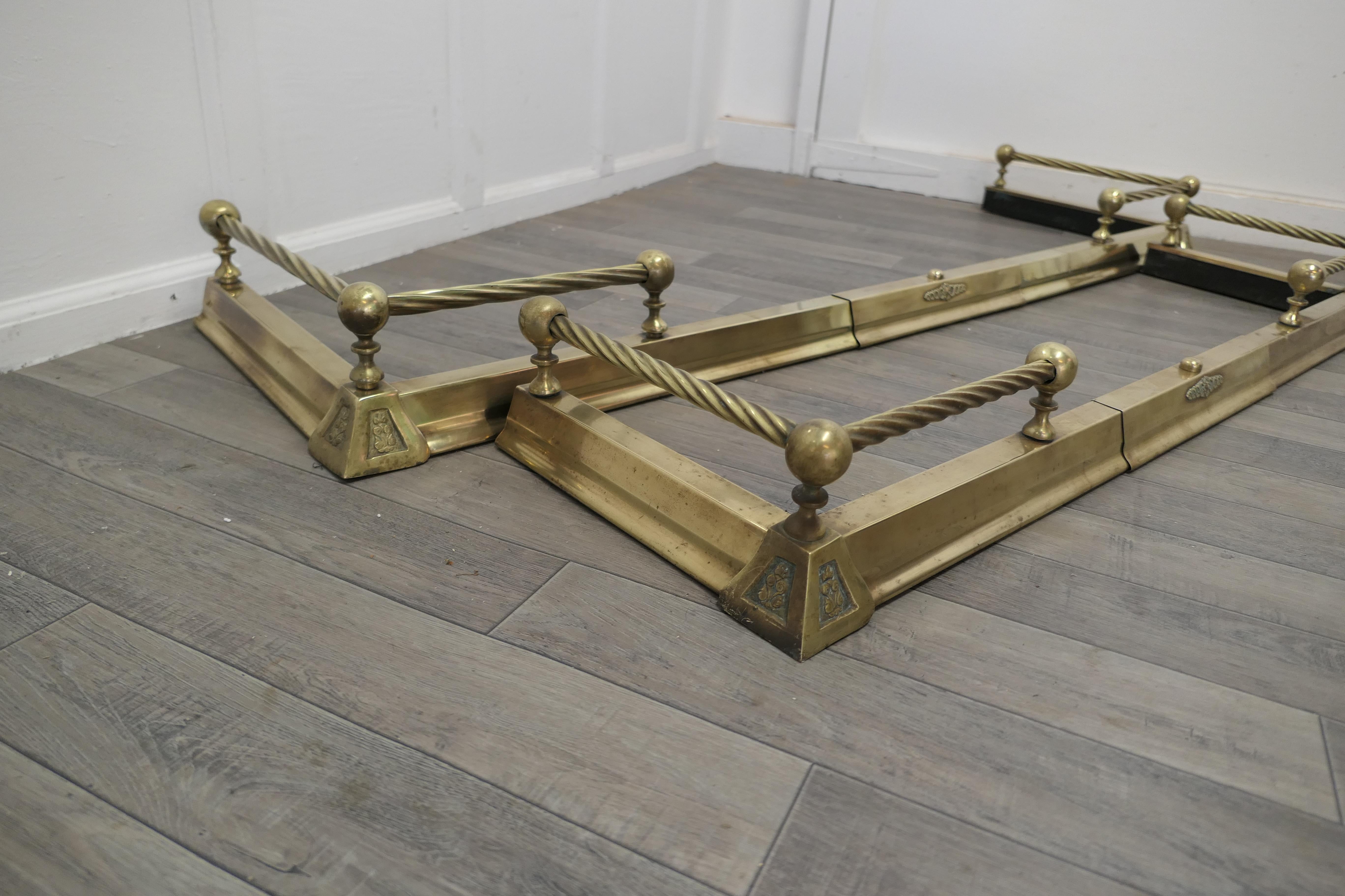 19th Century Pair of Victorian Extending Barley Twist Brass Fenders For Sale