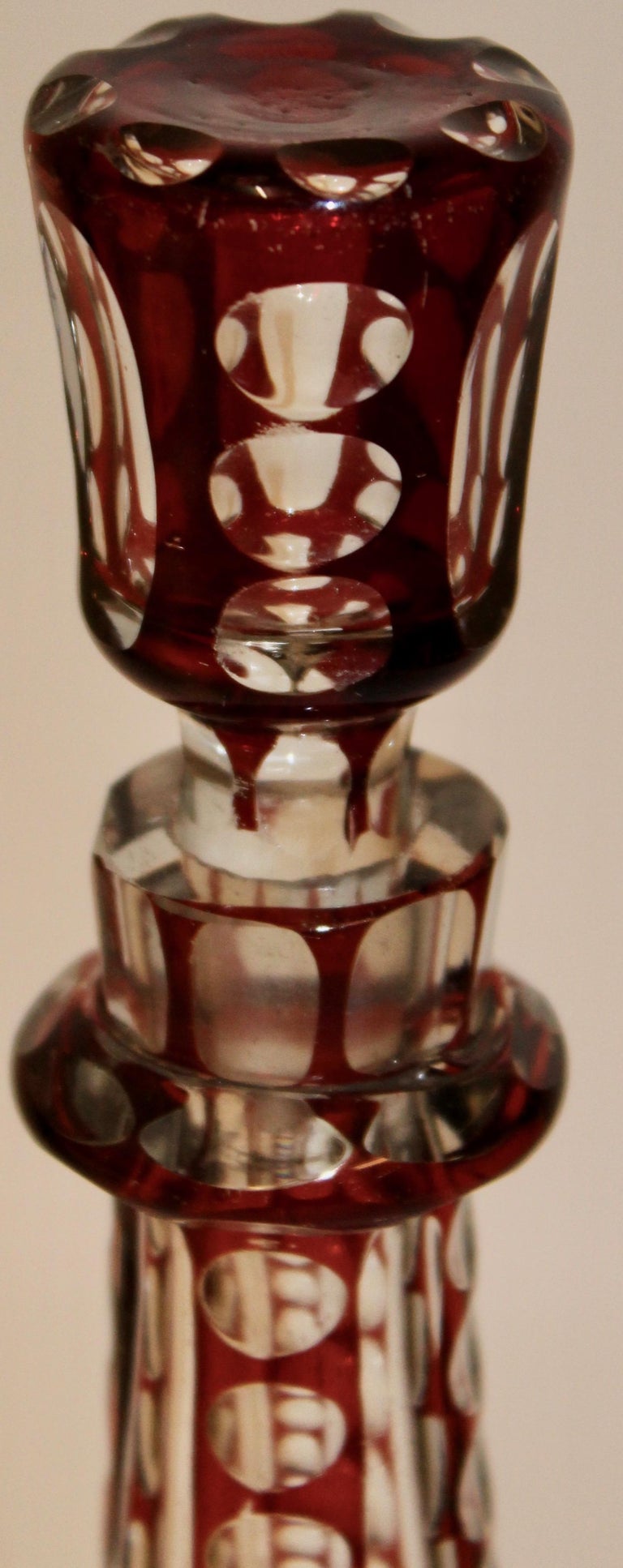 Pair of Victorian Facet Cut Red Glass Decanters and Stoppers, circa