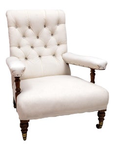A Pair of Victorian Howard and Sons Open Armchairs, Circa 1900