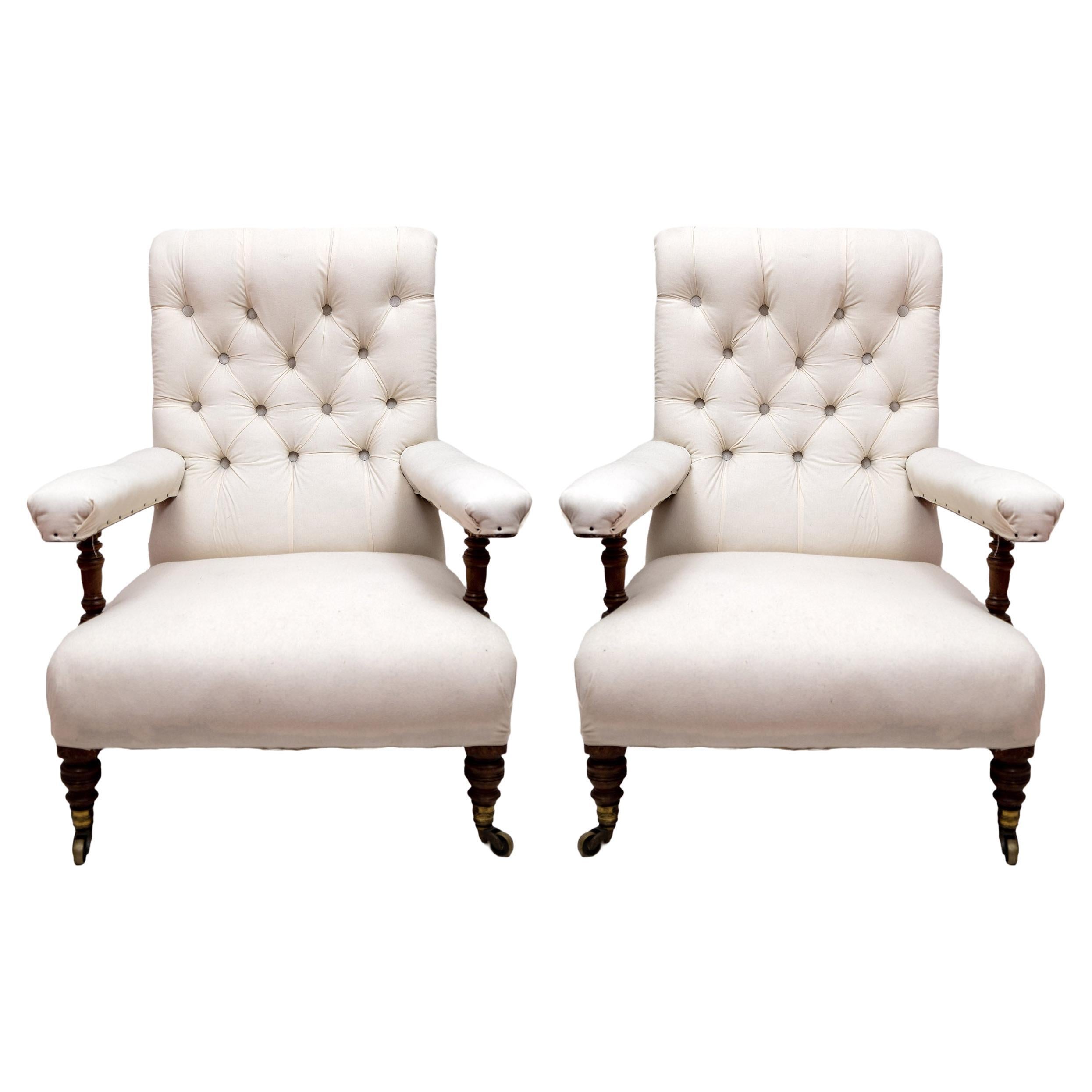 A Pair of Victorian Howard and Sons Open Armchairs, Circa 1900