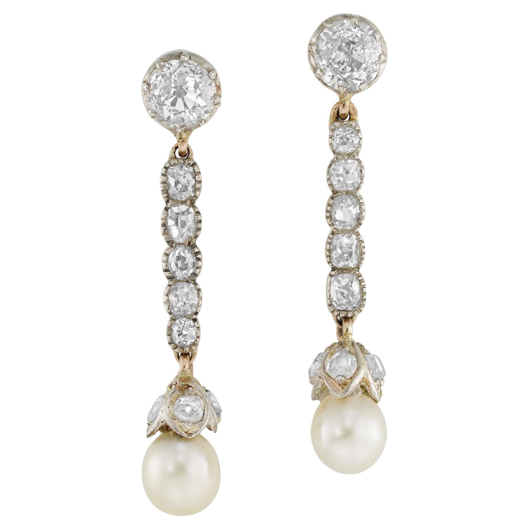 A pair of Victorian natural pearl and diamond drop earrings