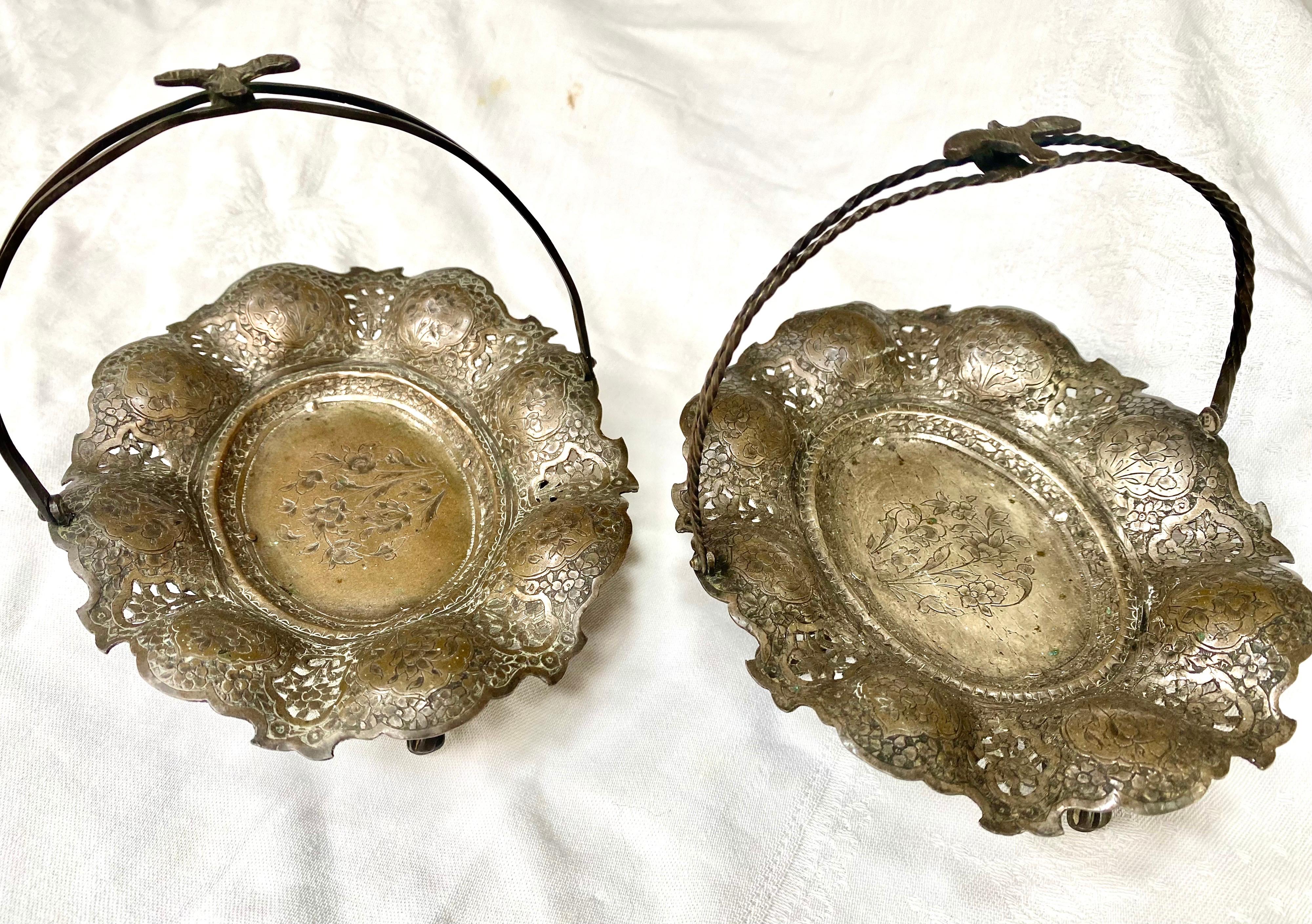 This beautiful antique silver plated pair of sweets dishes are in good condition. Visible signs of ageing and wear with some tarnishes and light scratches but still usable. The dimensions are 6.2 inches wide, 5 inches depth, 5 inches high(with the