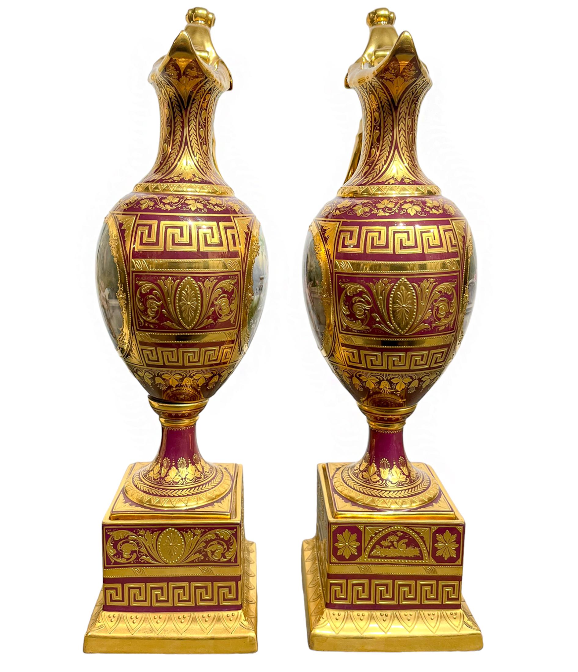 Hand-Painted A Pair of Vienna Style Porcelain Iridescent Burgundy Ground Ewers on Stands 