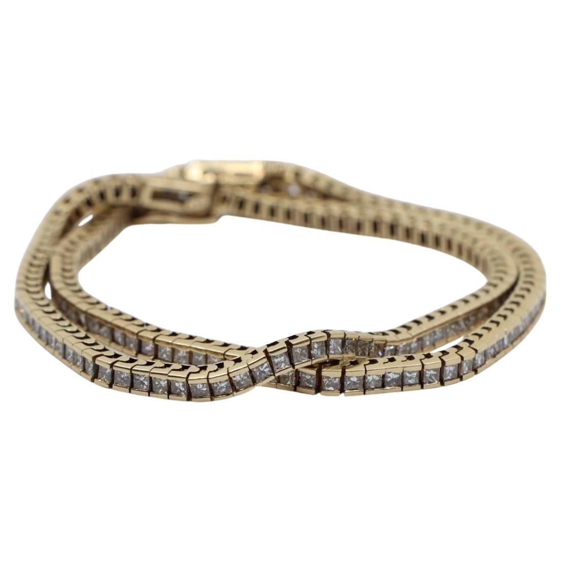 Un par de pulseras vintage de diamantes de oro de 14 quilates