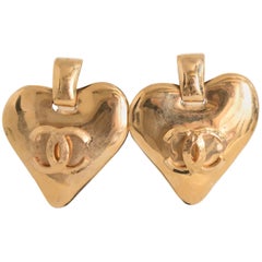 A Pair of Vintage Chanel 1993 Gold Toned Heart Clip On Earrings