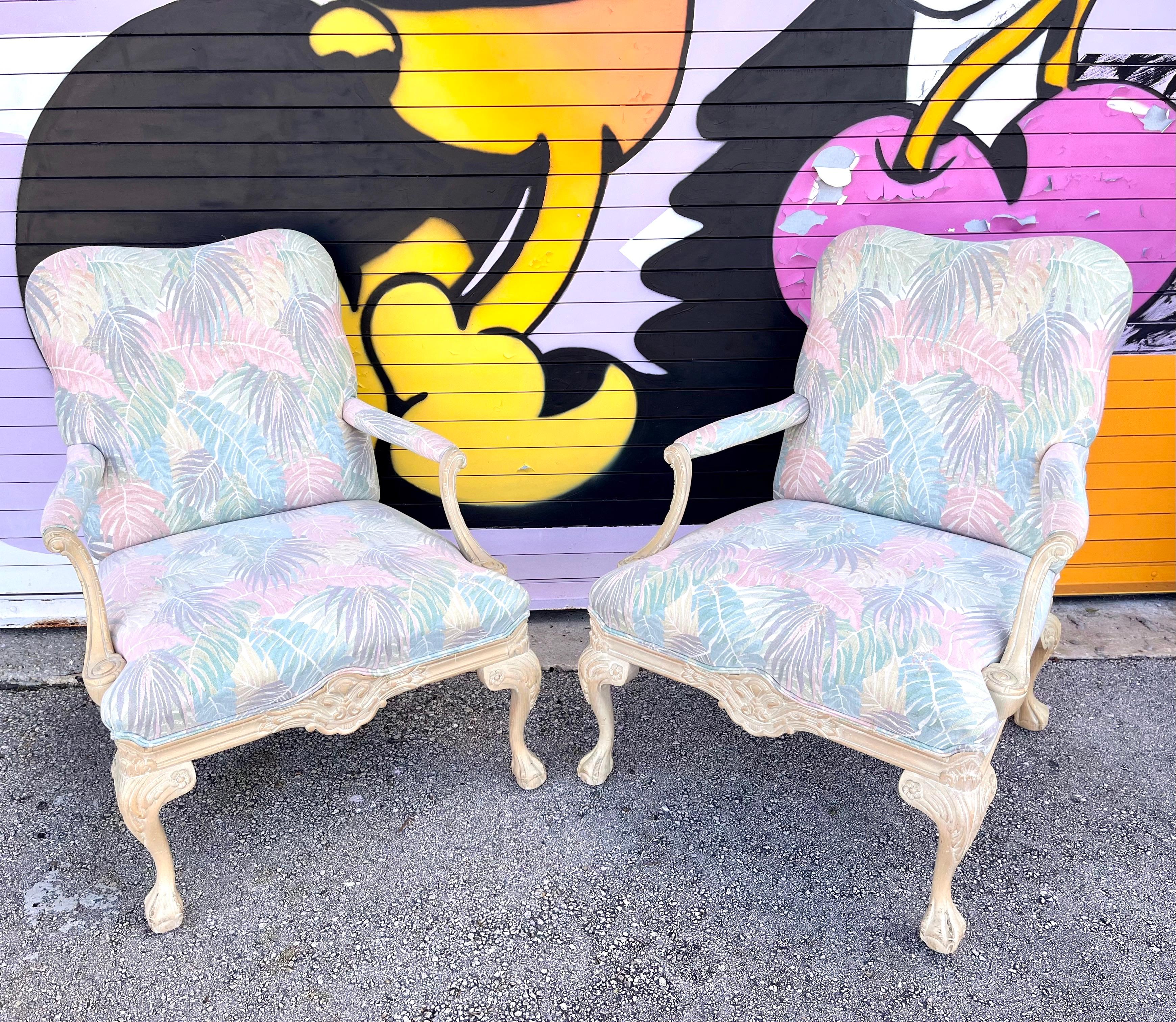 A Pair of Coastal Style Bergere Armchairs by Sherrill Furniture. Circa 1980s  
Feature a Classic Style French Bergere Chair Light Tan Carved Wood Frame, Upholstered with a Coastal Style Botanical Print in Muted Pastel Colors. 
In excellent near mint